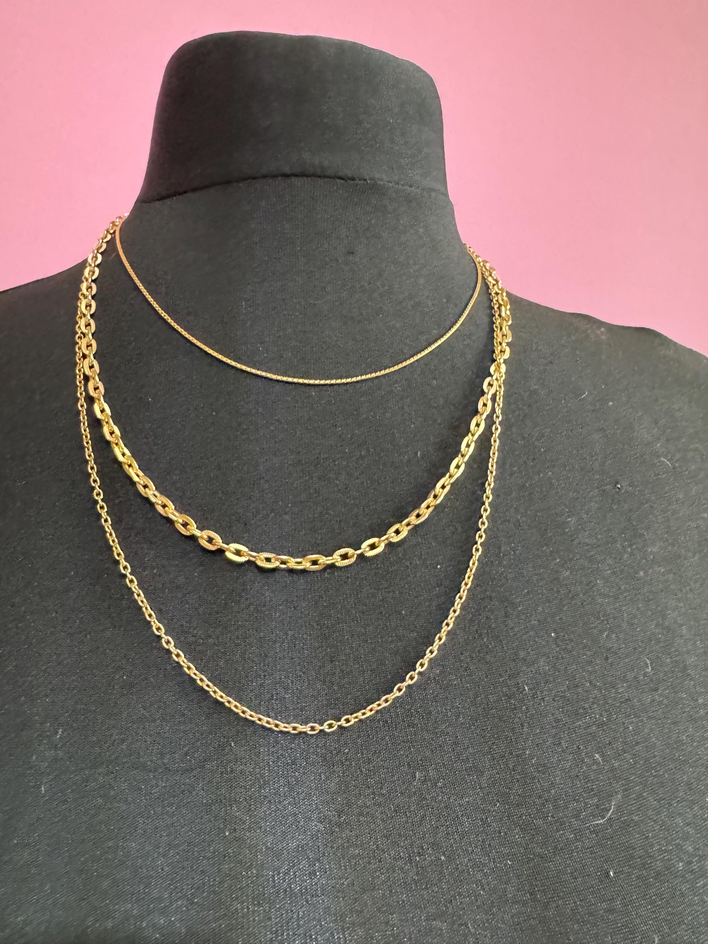 lightweight Vintage 1960s modernist gold tone multistrand drape necklace with ornate blue crystal clasp