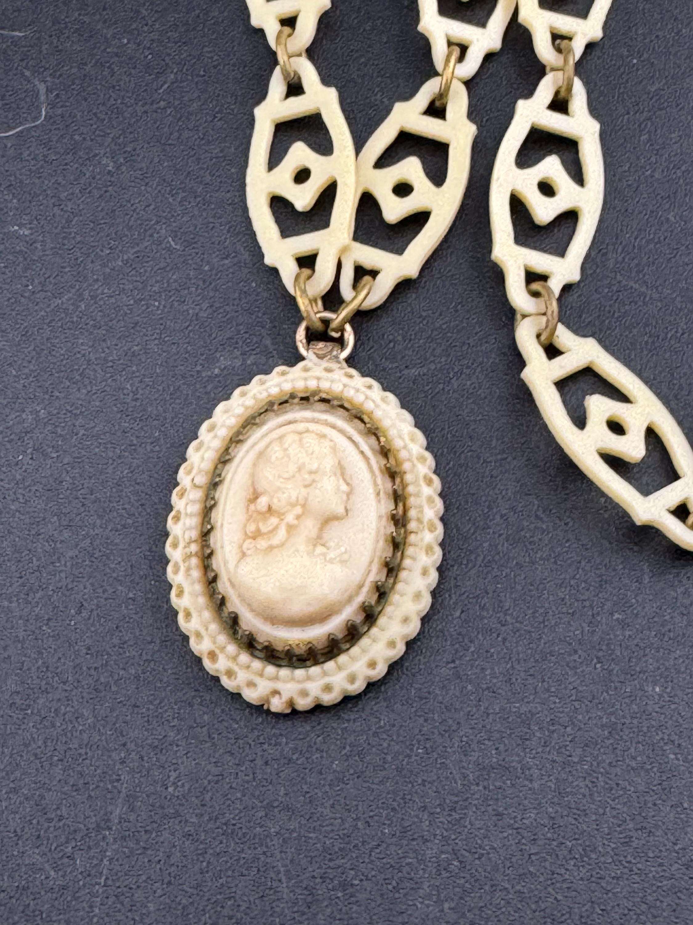 True Art Deco cameo lady pendant necklace cream thin celluloid early plastic cut out floral motif 56cm