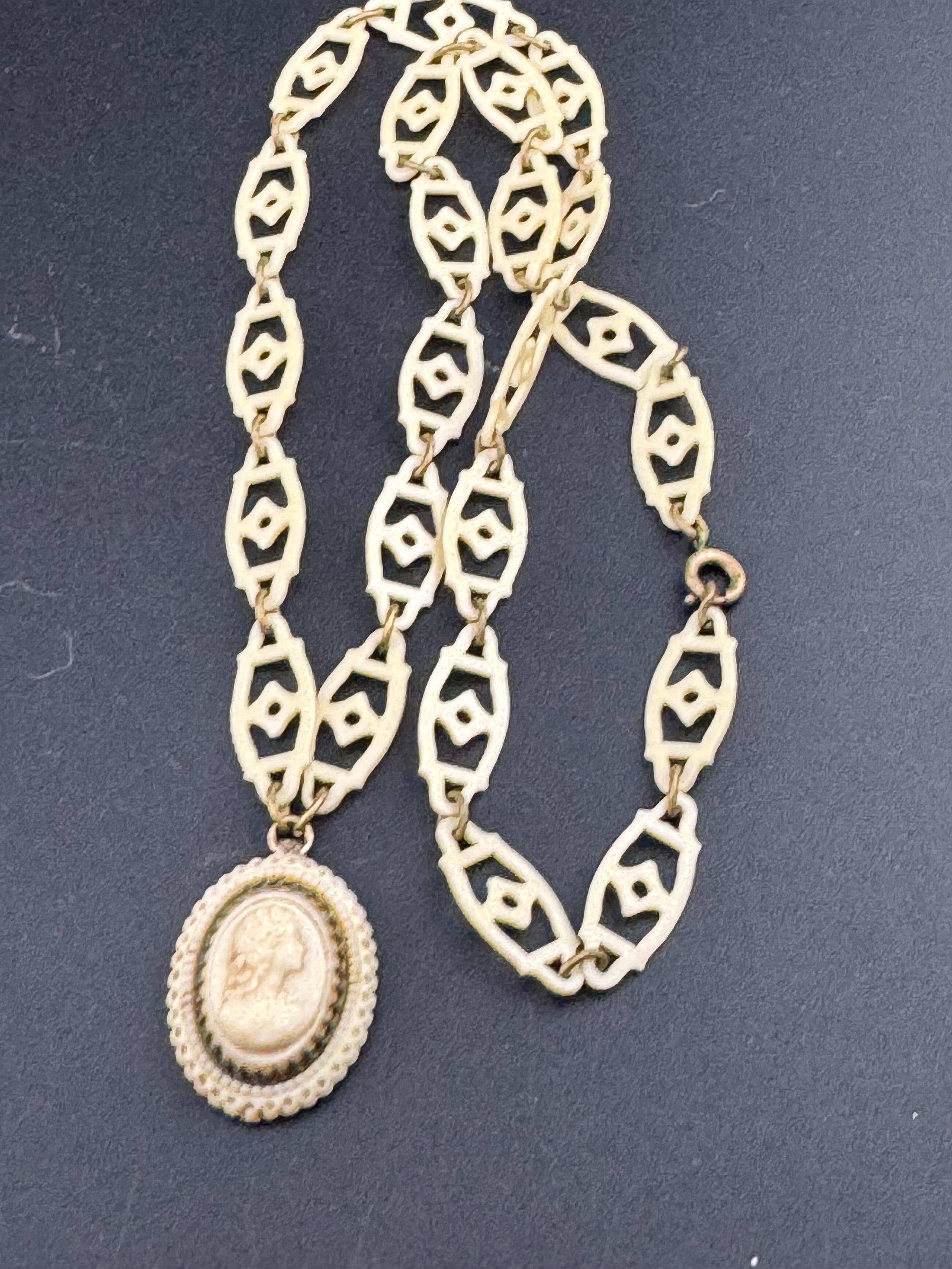 True Art Deco cameo lady pendant necklace cream thin celluloid early plastic cut out floral motif 56cm
