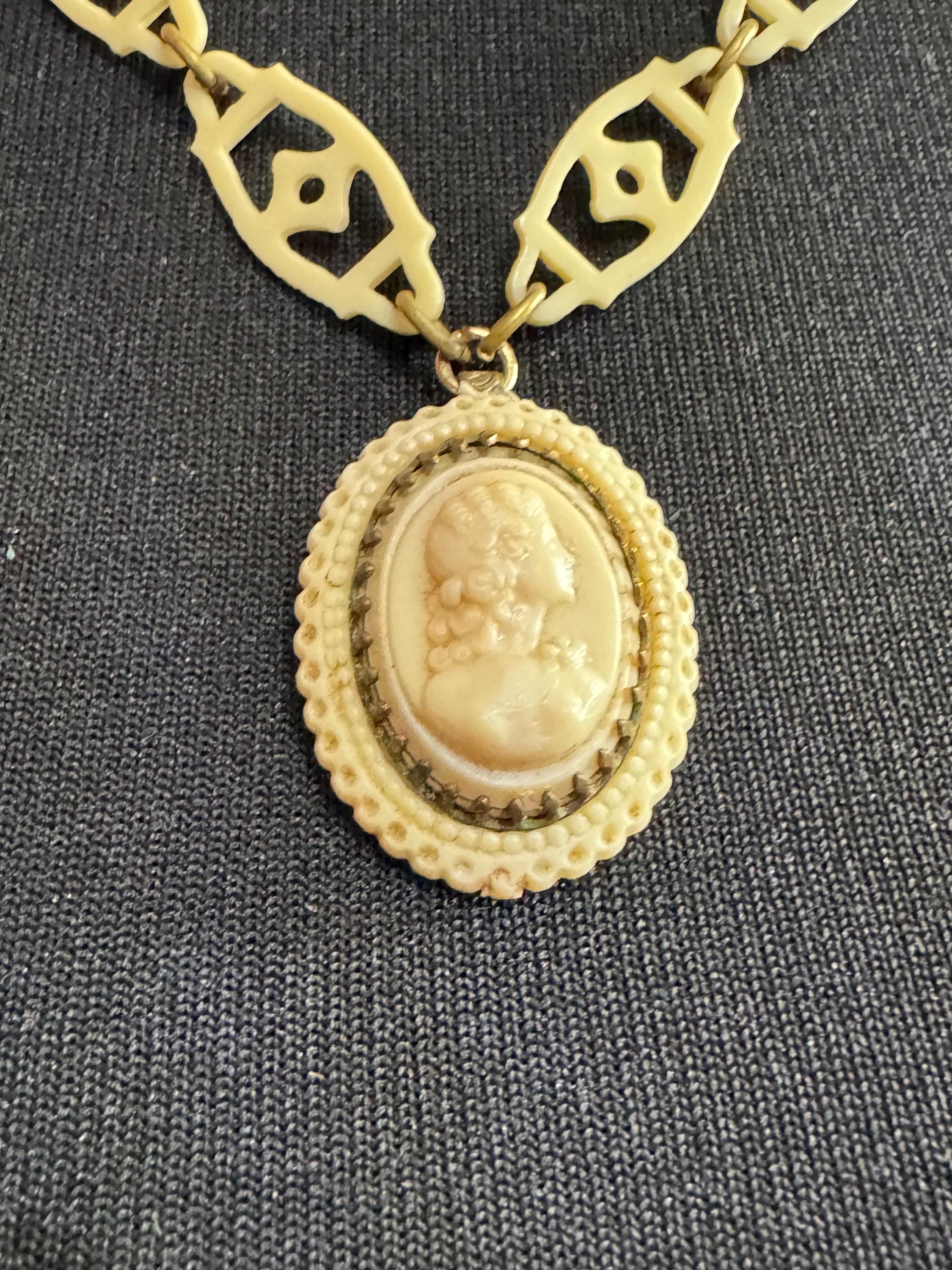True Art Deco cameo lady pendant necklace cream thin celluloid early plastic cut out floral motif 56cm