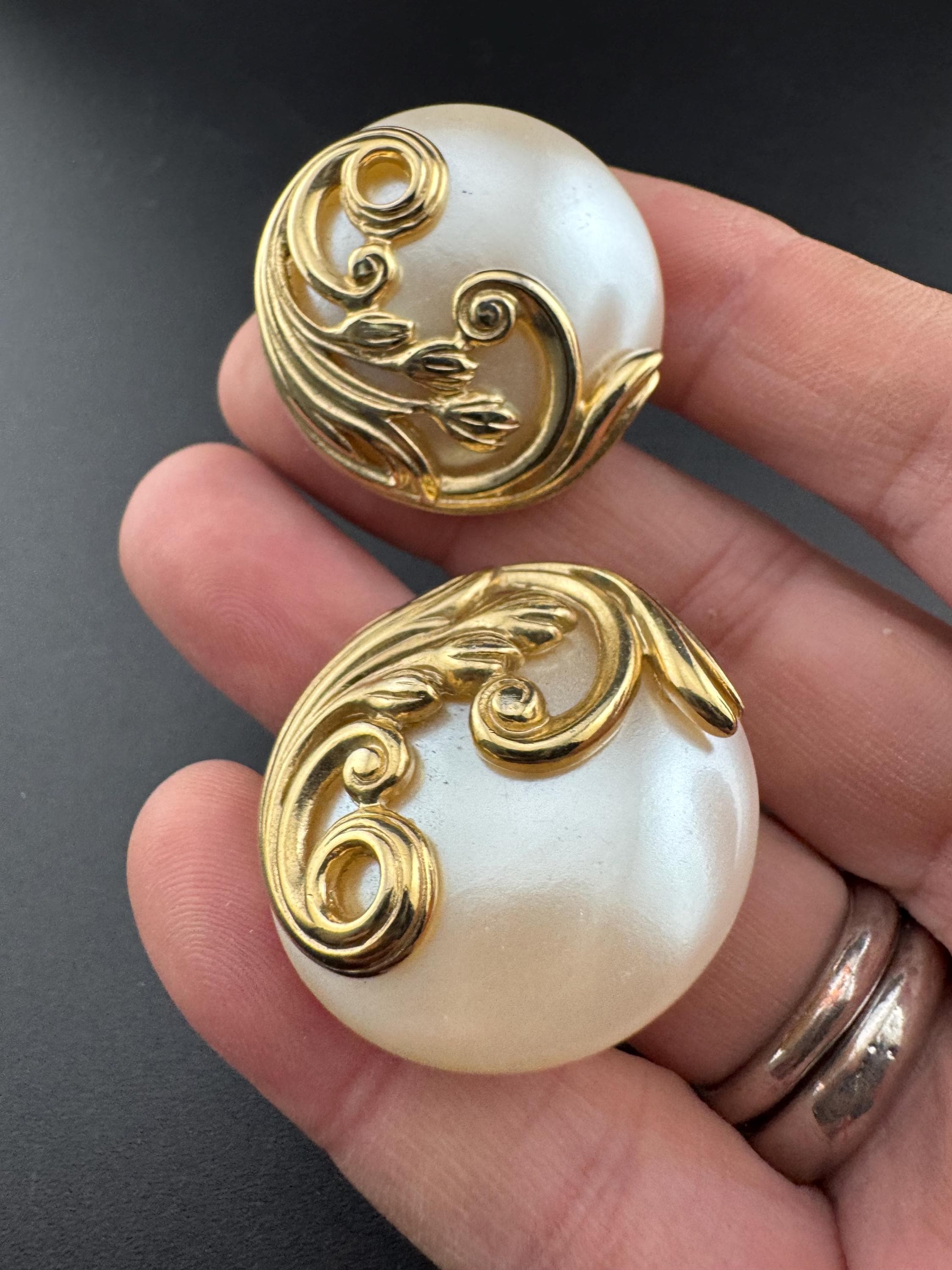 Oversized faux pearl plastic disc pierced earrings with gold tone ornate edge, big studs