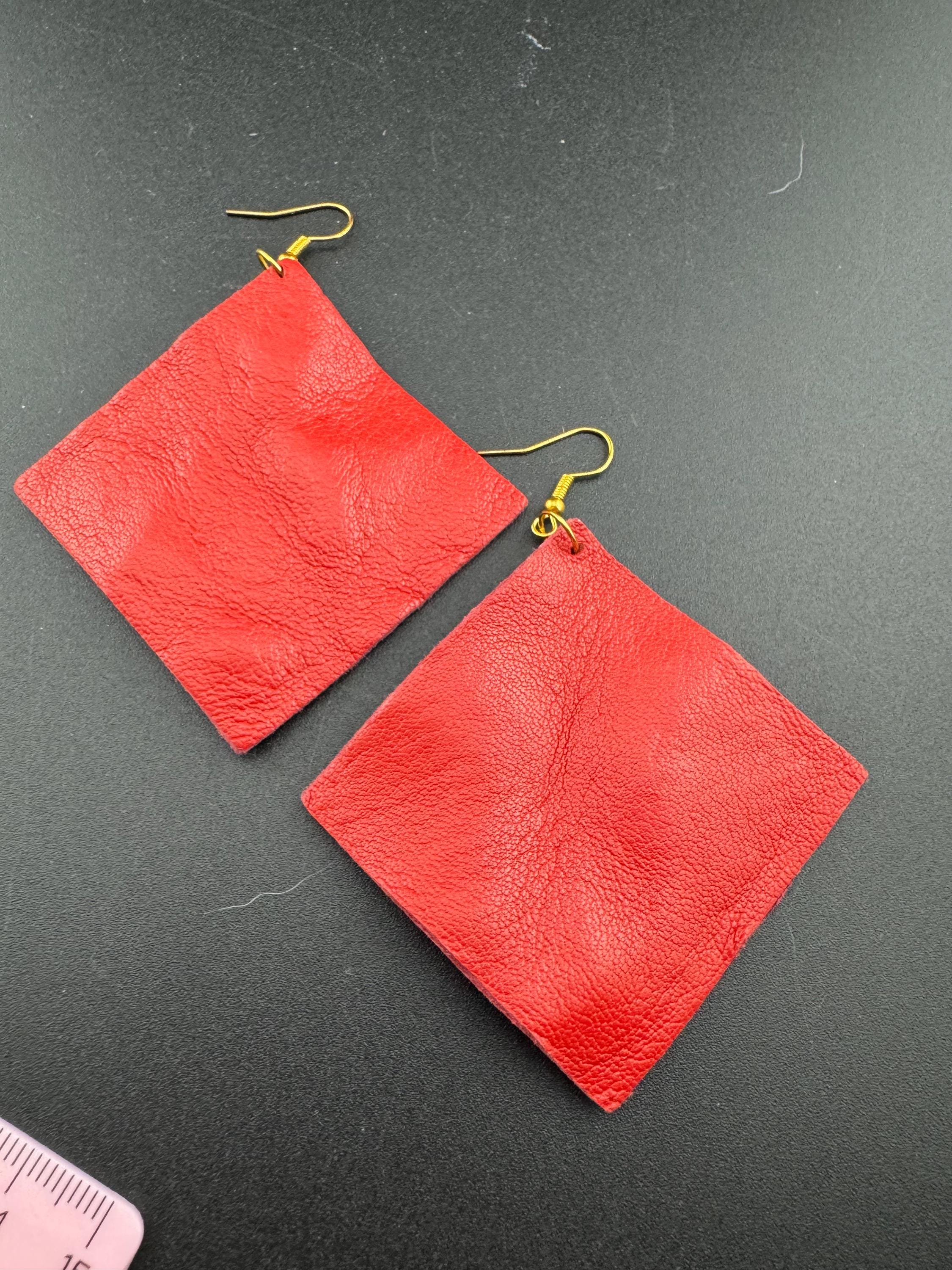 Retro 1980s style bright red leather geometric square diamond shaped  dangly drop earrings for pierced ears, 80s fashion