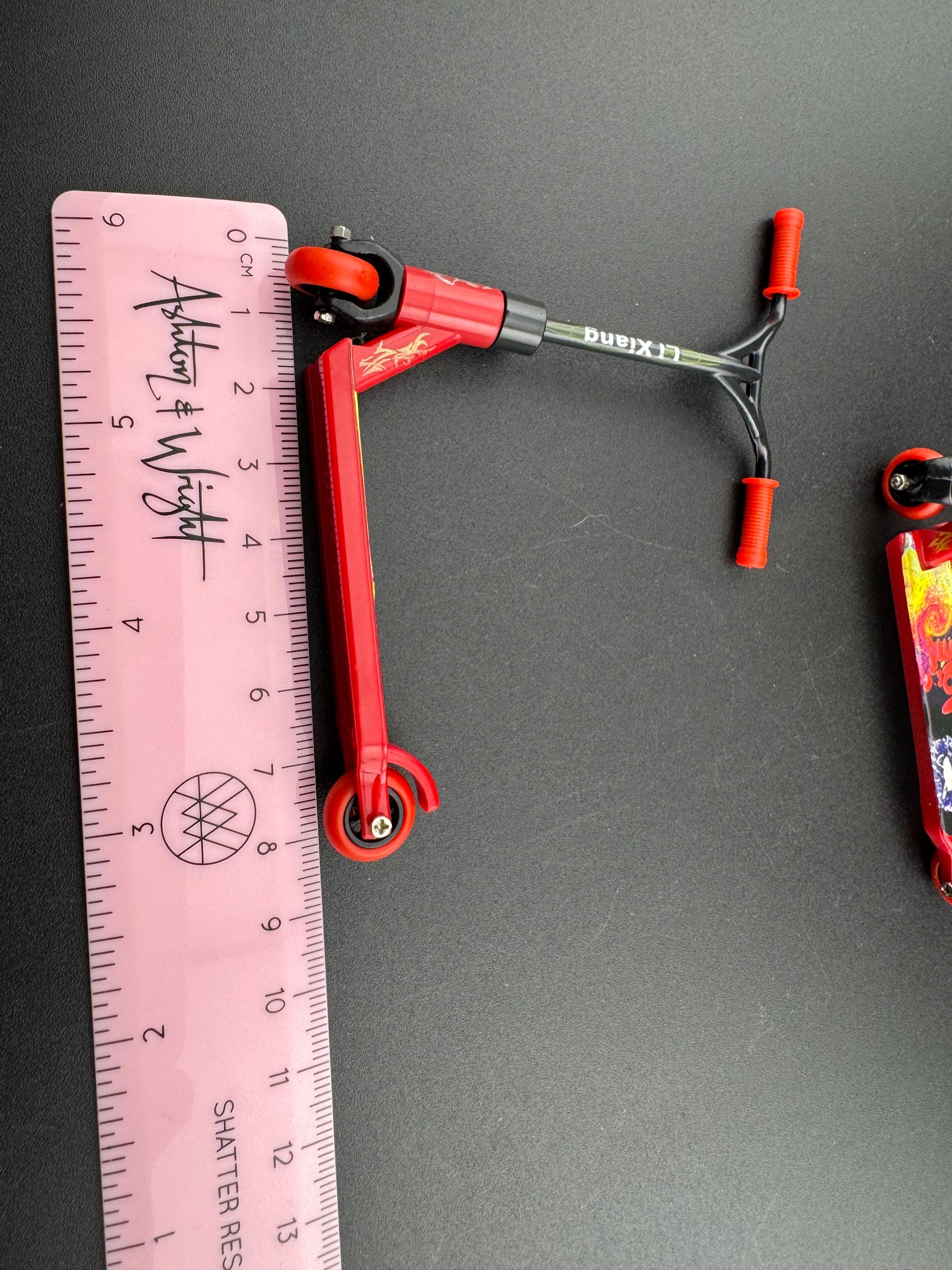 1 piece Miniature red and black scooter cake topper decoration plastic finger operated sports