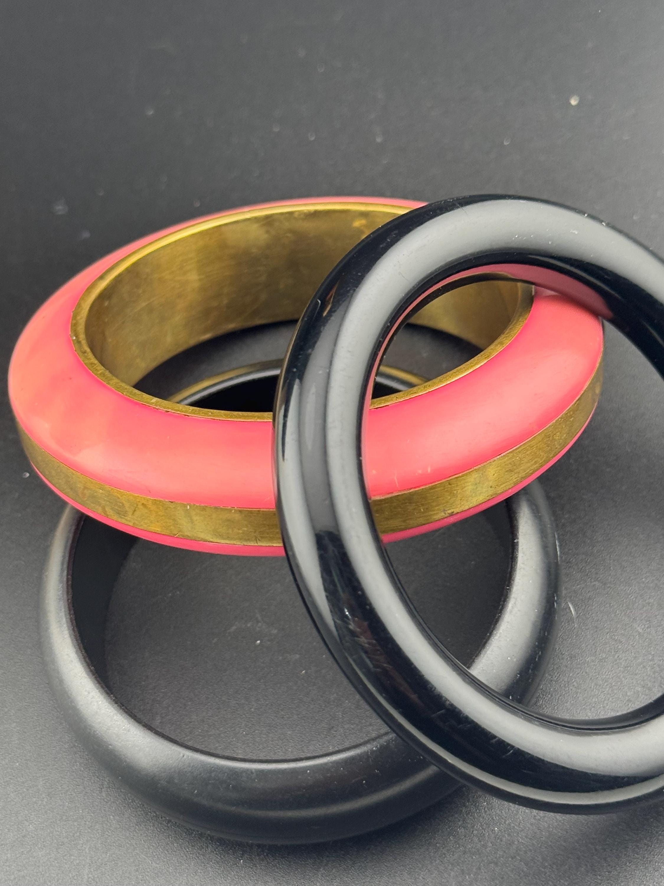 Vintage stack of black and pink Chunky stylish plastic bangles retro acrylic bracelets