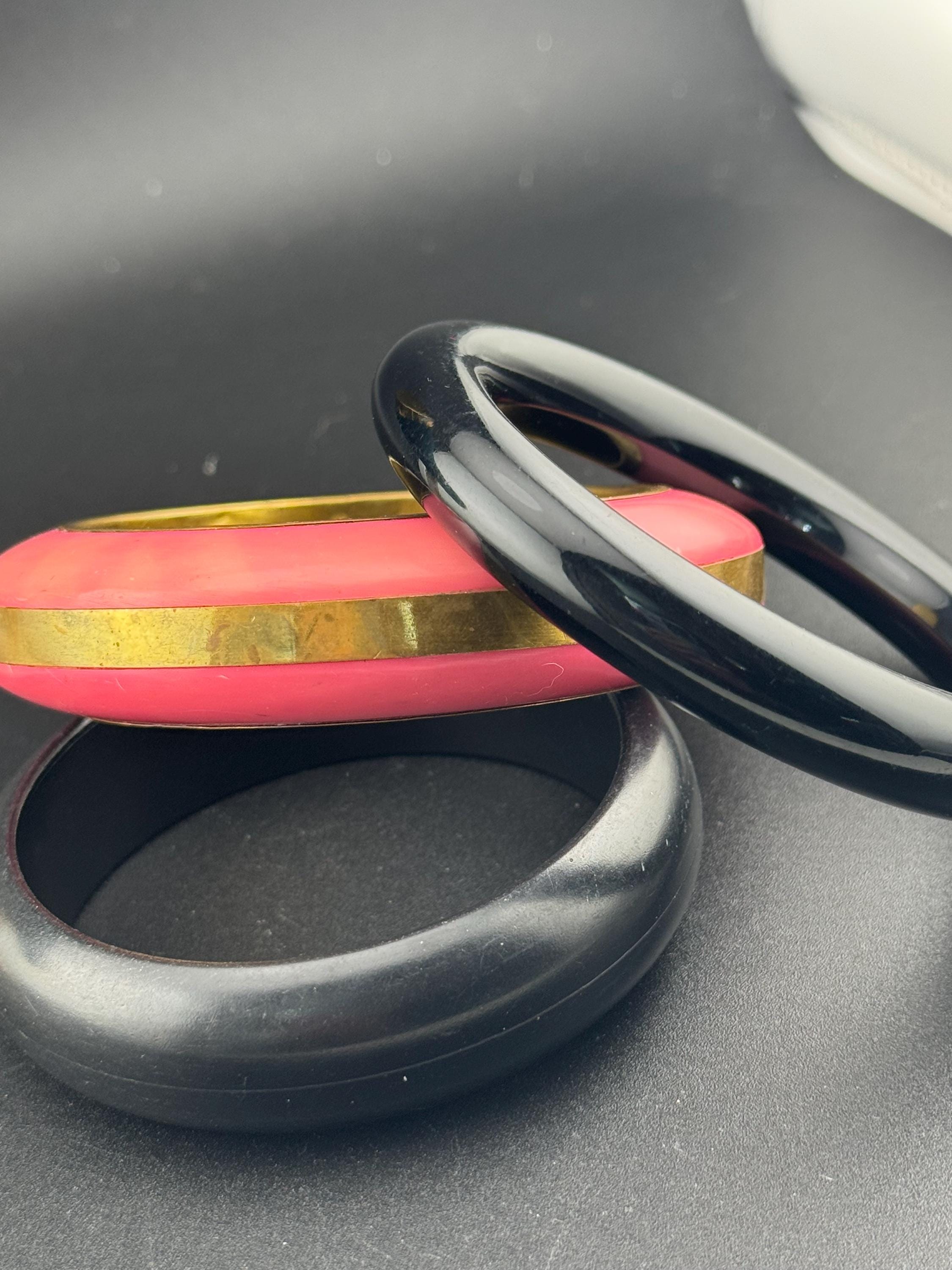 Vintage stack of black and pink Chunky stylish plastic bangles retro acrylic bracelets