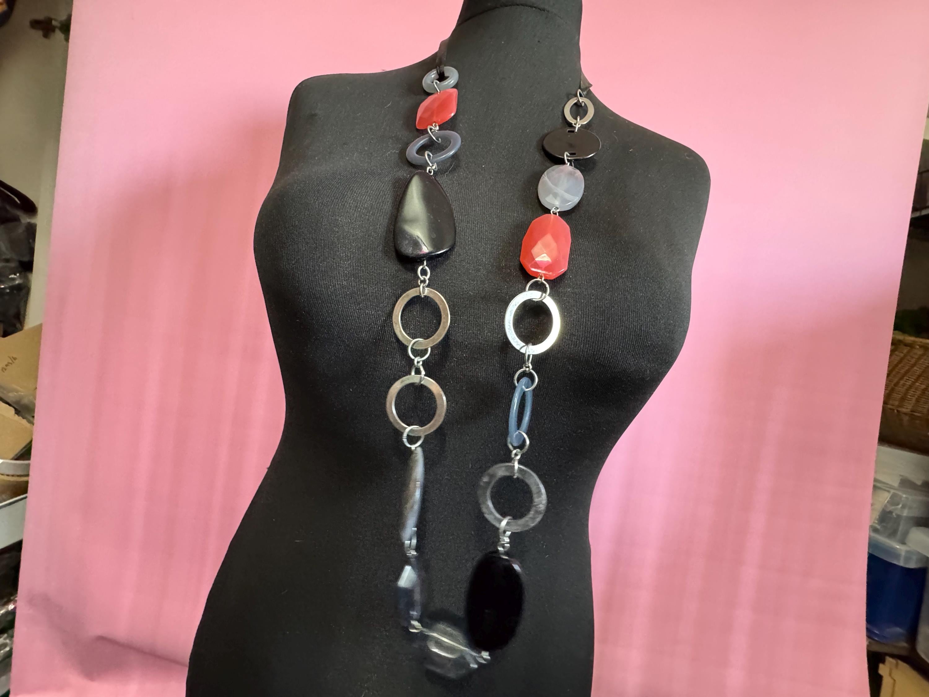 Retro long black red grey plastic abstract disc beaded station necklace 2000s on a black ribbon