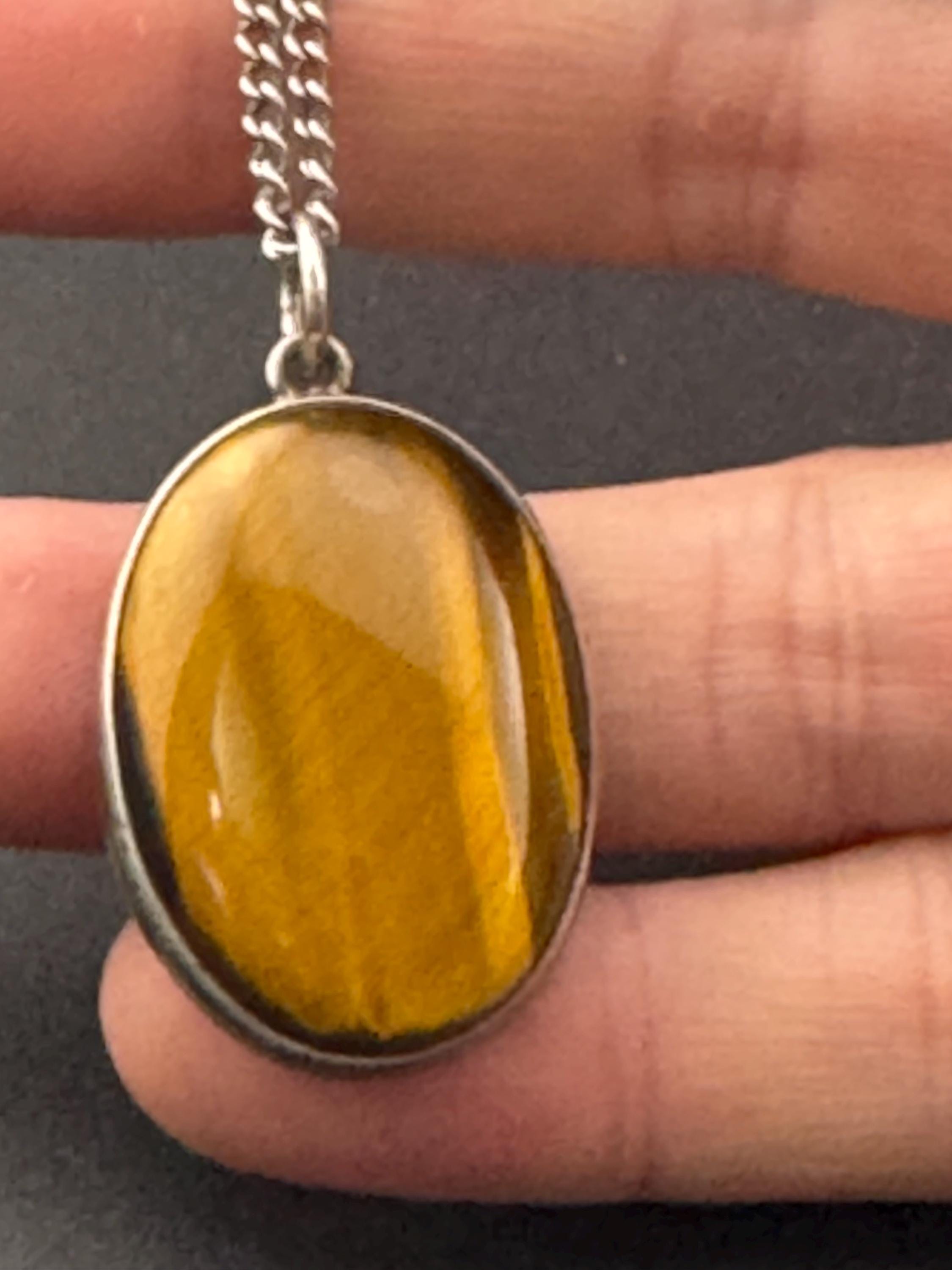 Solid silver tigerseye oval gemstone pendant necklace on 54cm chain 1970s weighs 13.7 grams