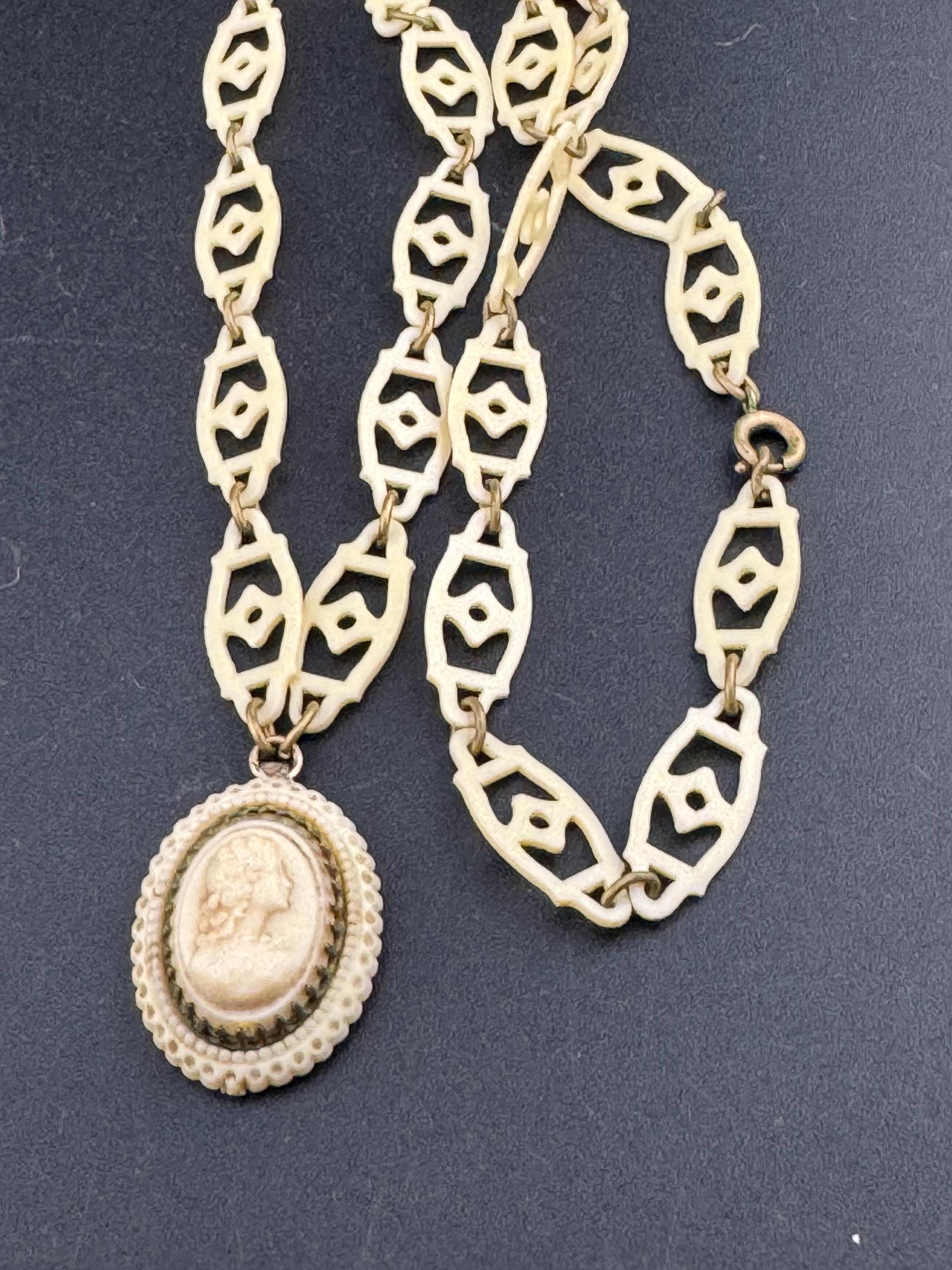 True Art Deco cameo lady pendant necklace cream thin celluloid early plastic cut out floral motif 56cm