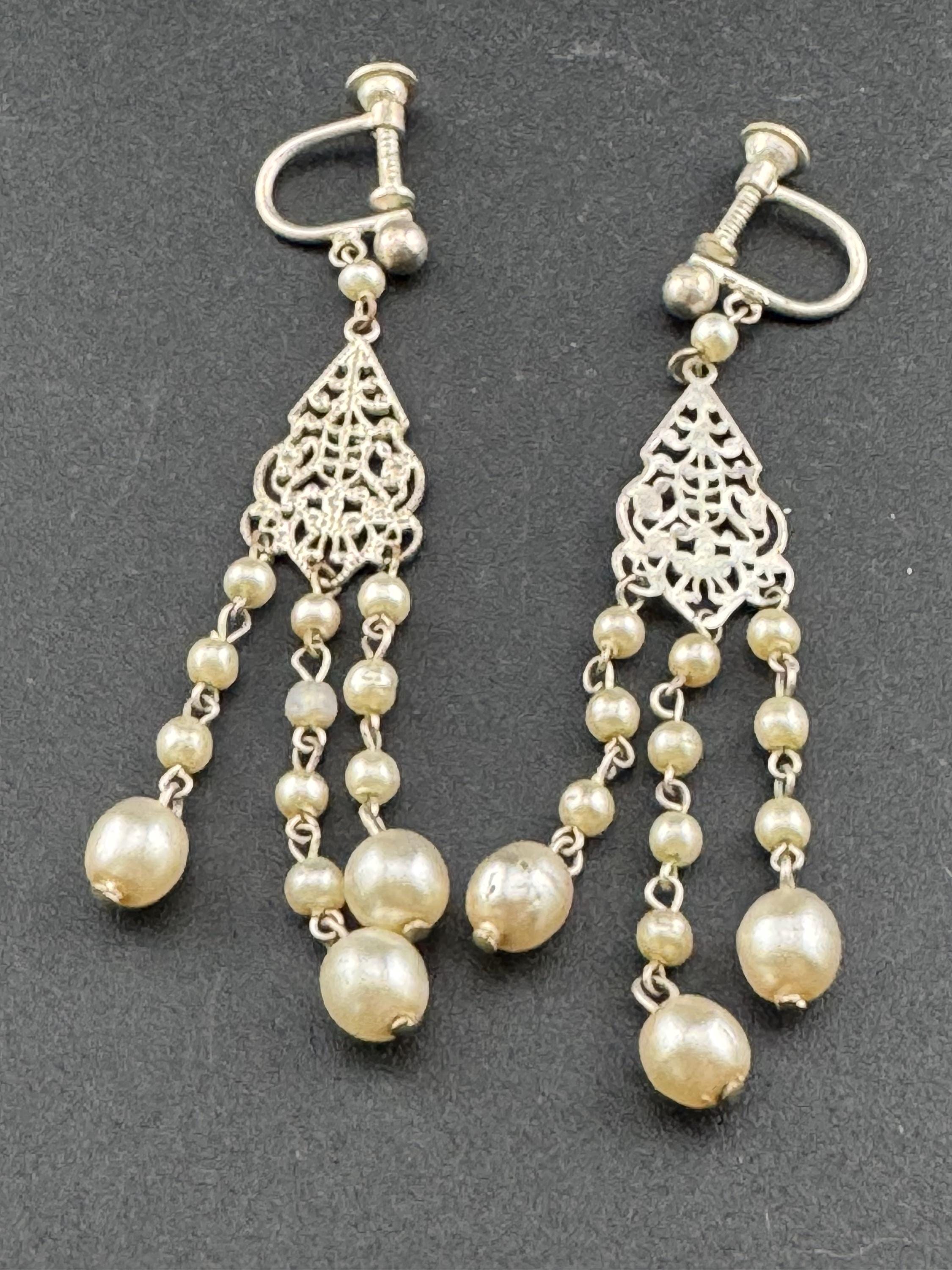 Vintage signed Czecho Slovak silver Tone Filigree metal with faux pearl beads, screw back dangly long clip on earrings