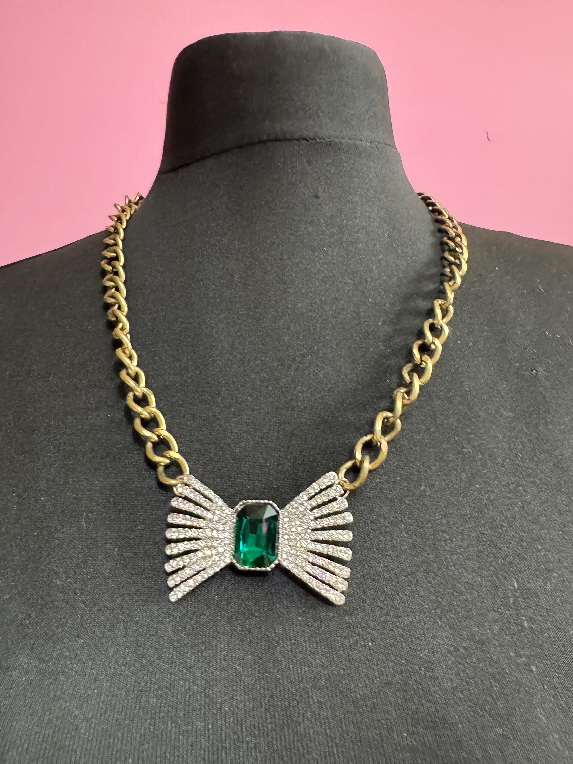 Retro Emerald green  and clear crystal weighty bow necklace on a antique gold chunky chain 63cm