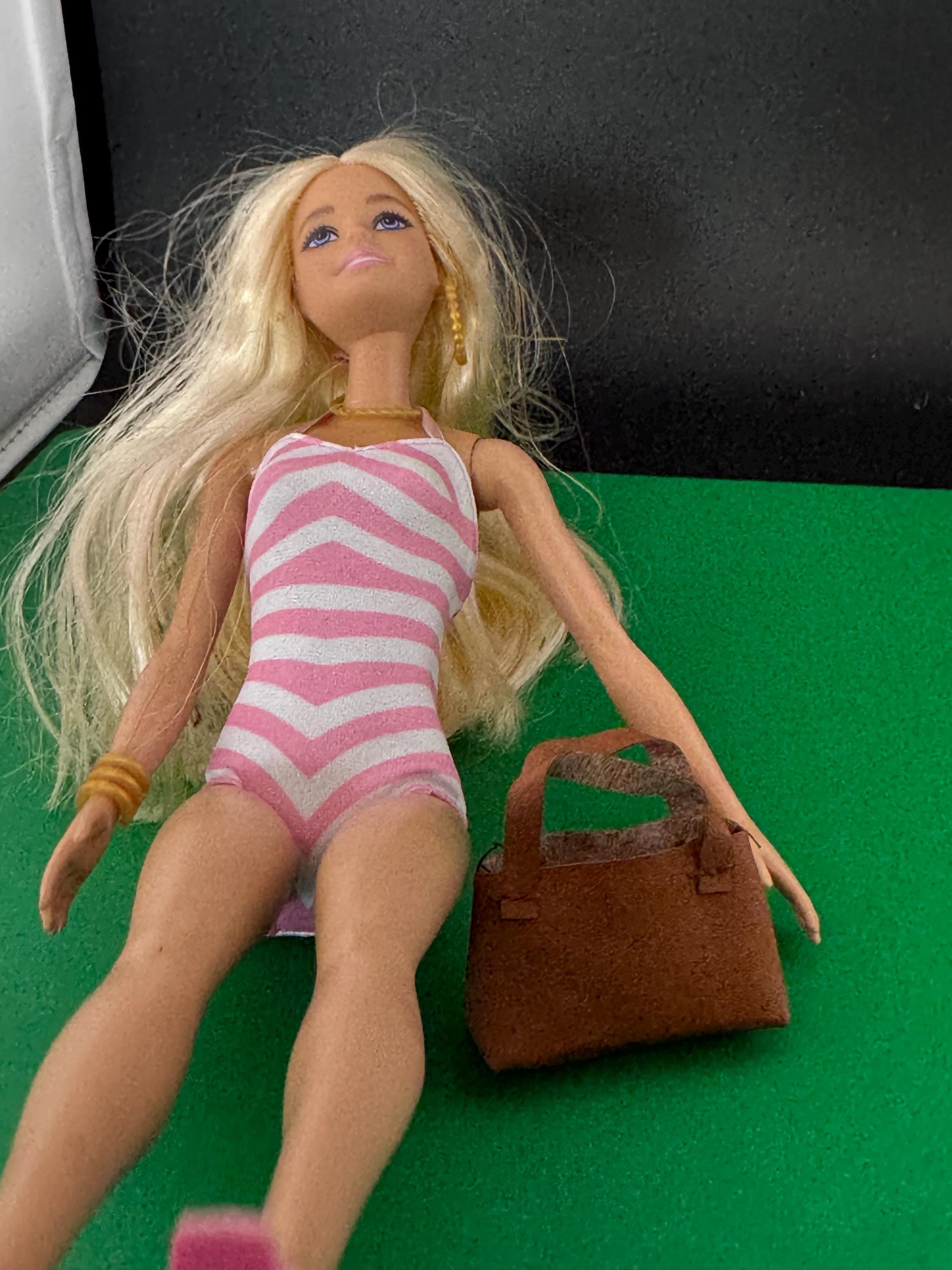 miniature brown tote handbag cake topper decoration for a dolls cake