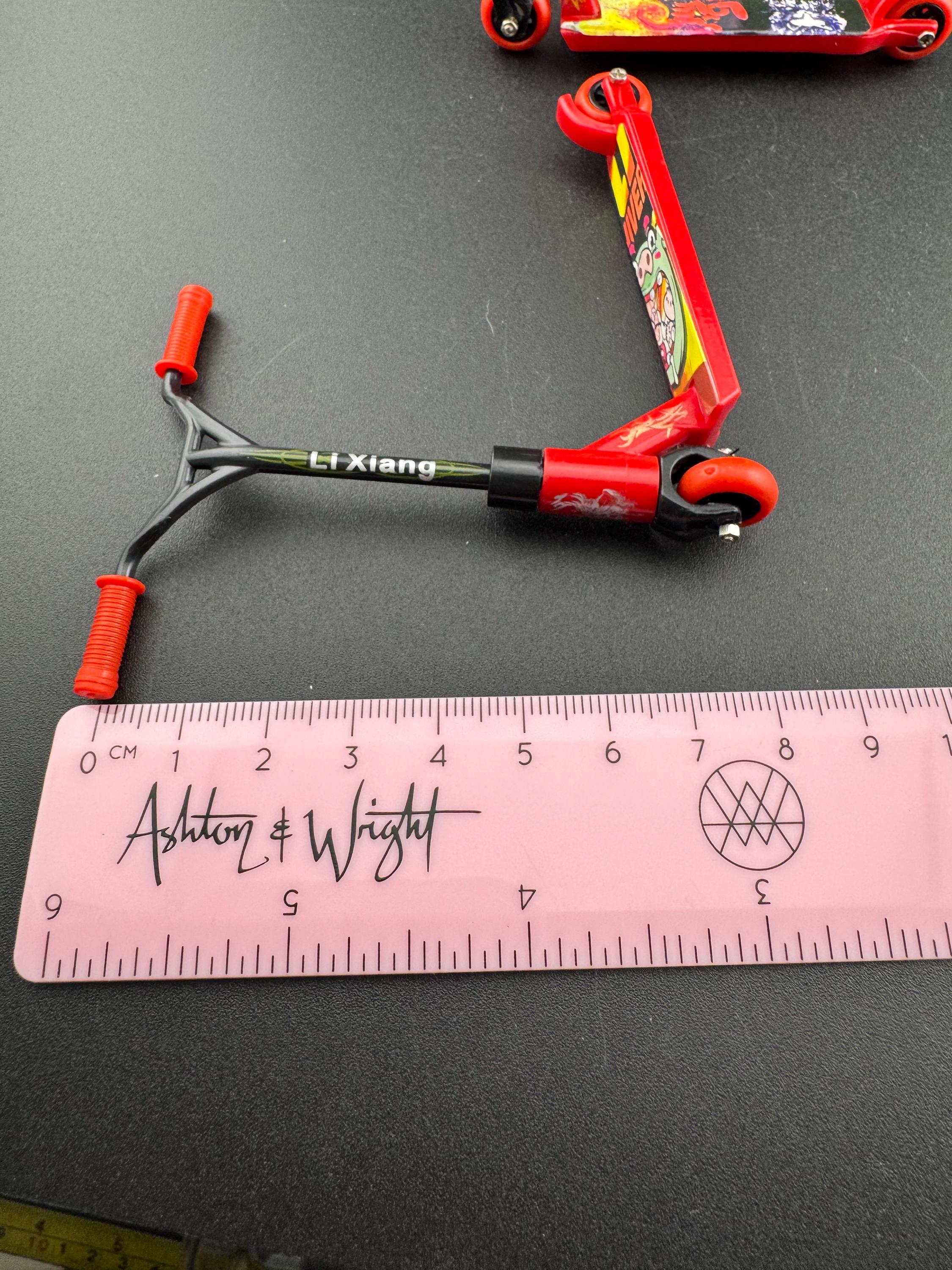 1 piece Miniature red and black scooter cake topper decoration plastic finger operated sports