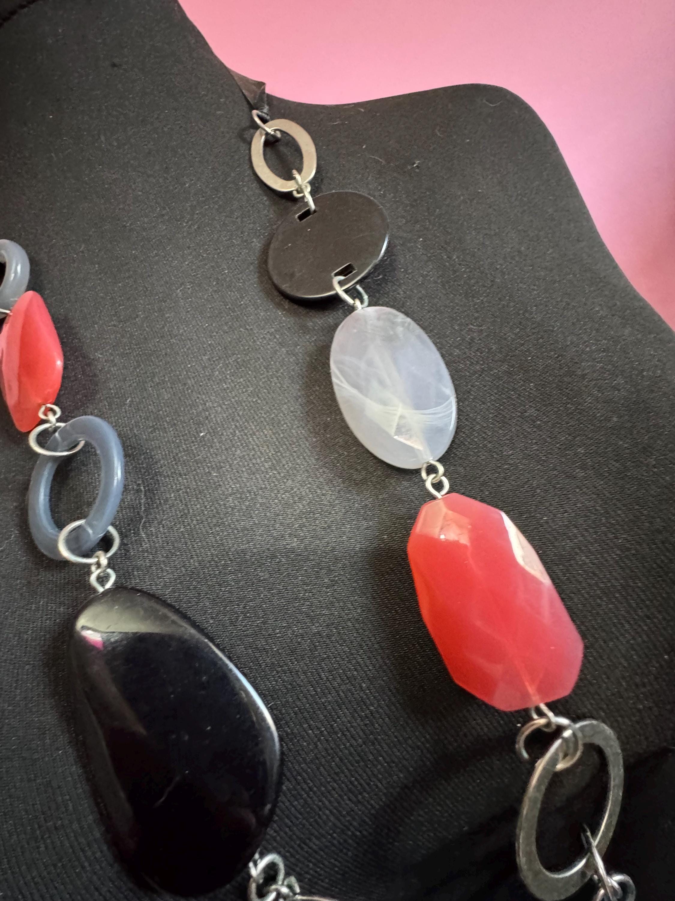 Retro long black red grey plastic abstract disc beaded station necklace 2000s on a black ribbon