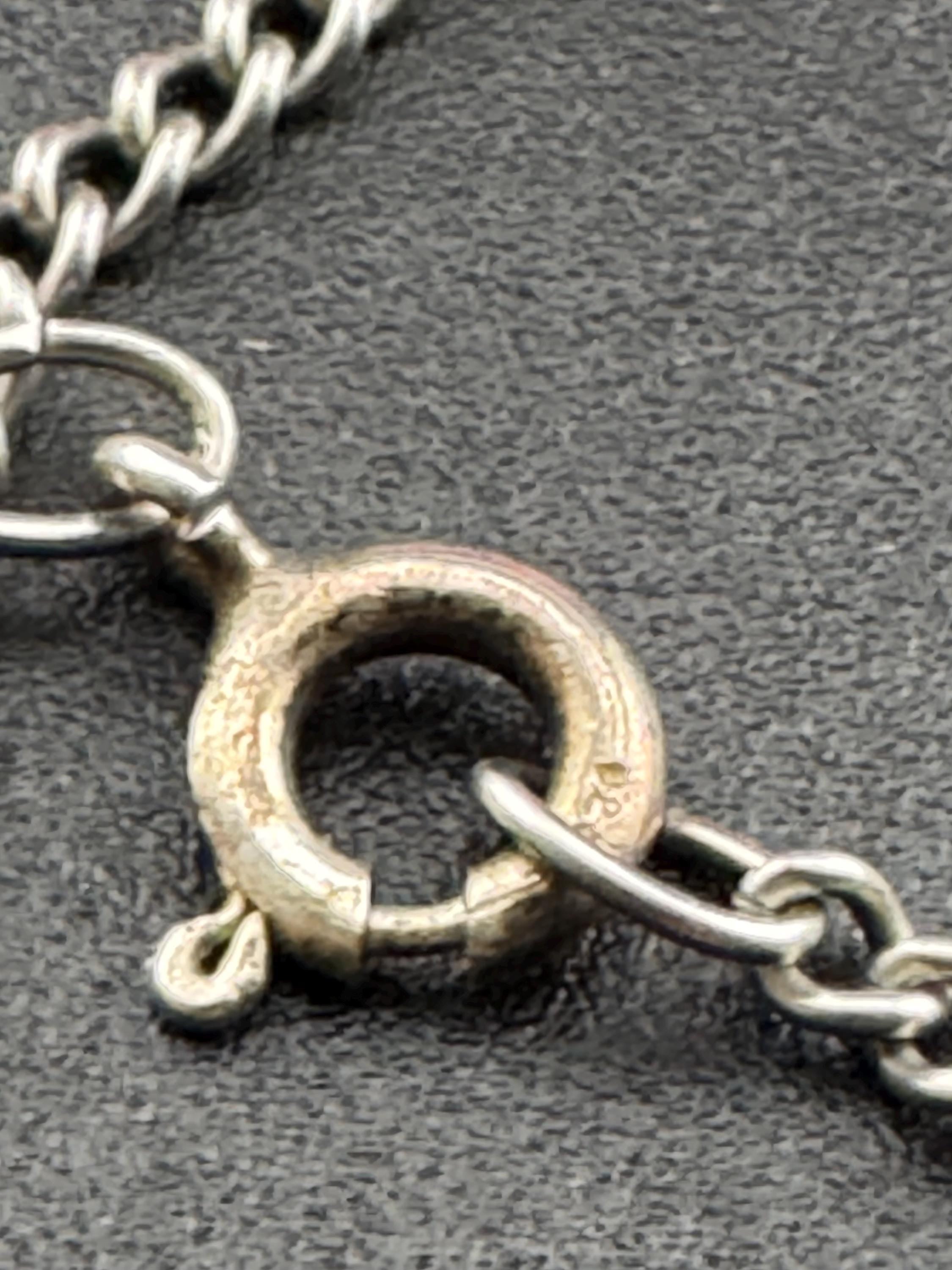 Solid silver tigerseye oval gemstone pendant necklace on 54cm chain 1970s weighs 13.7 grams