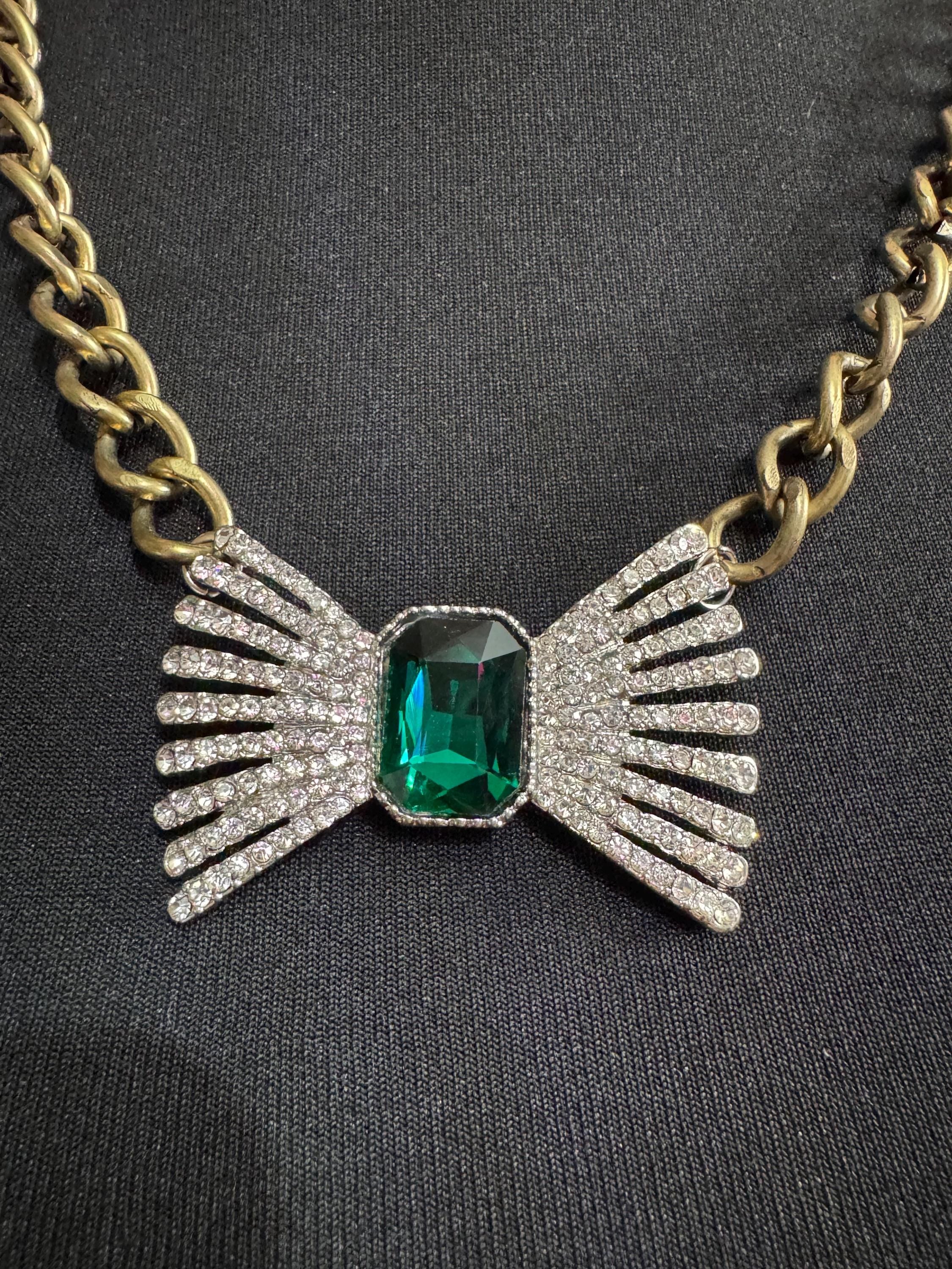 Retro Emerald green  and clear crystal weighty bow necklace on a antique gold chunky chain 63cm