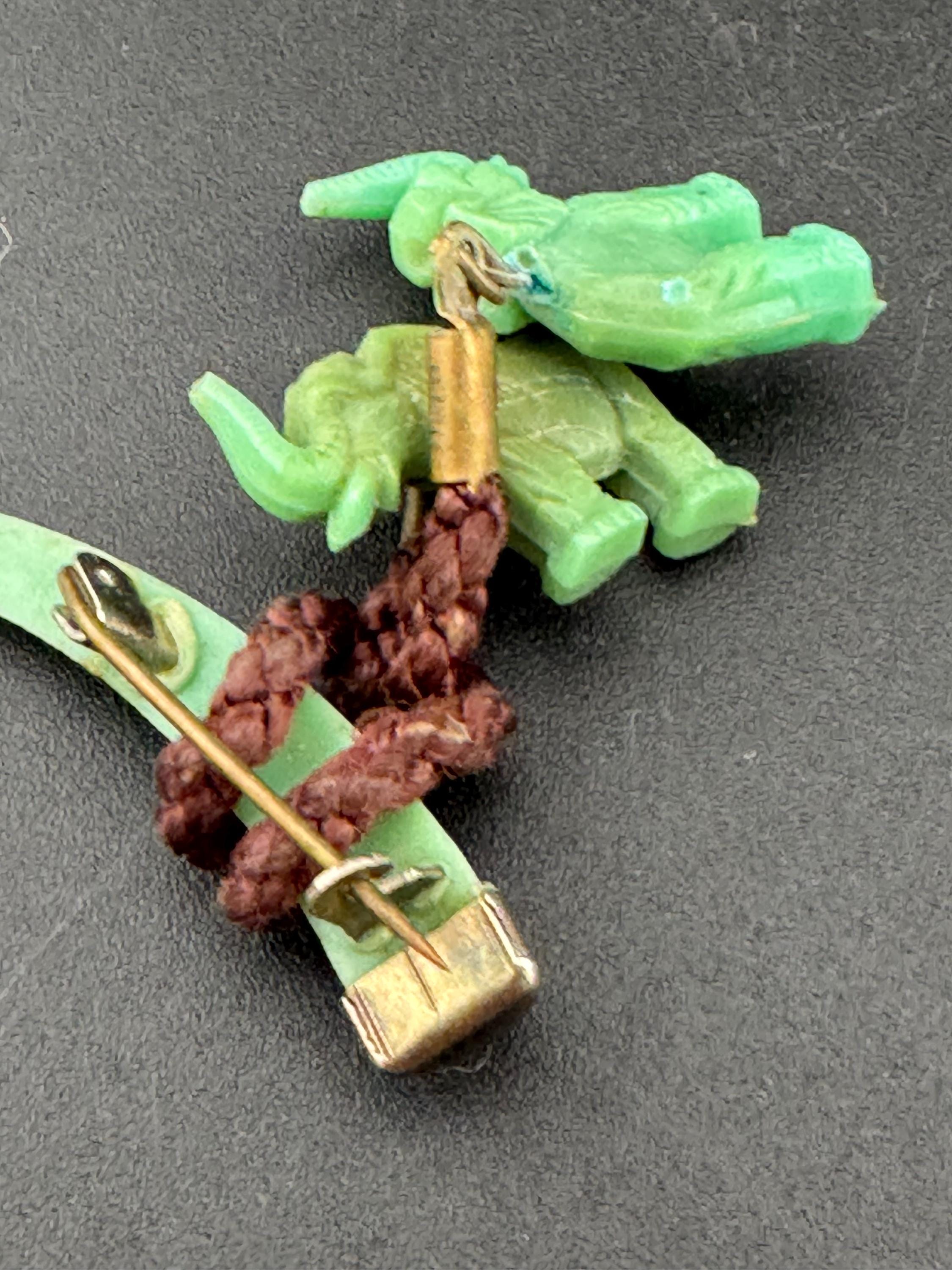 Vintage Celluloid Early Plastic Green dangly Elephant brooch 1920s