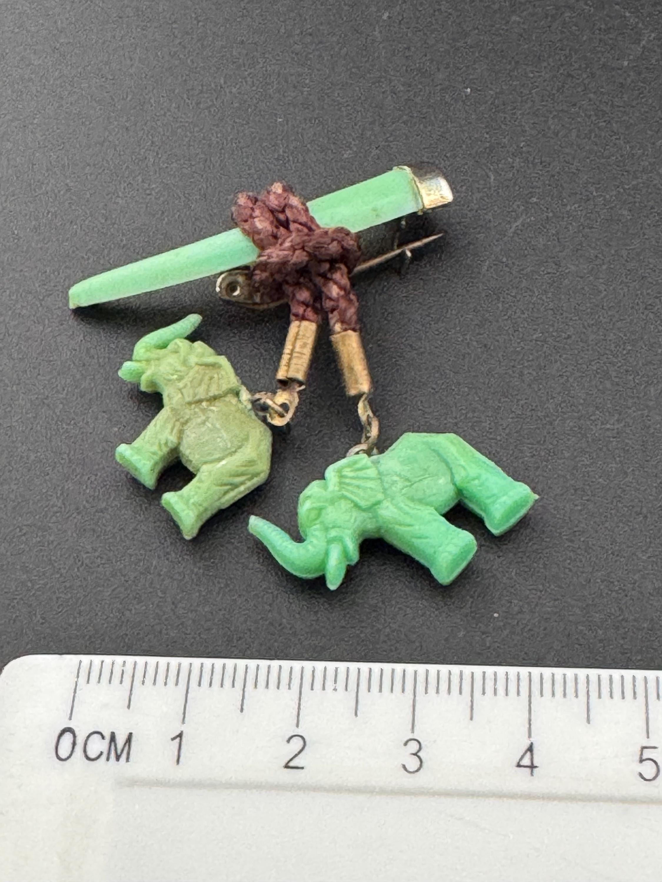 Vintage Celluloid Early Plastic Green dangly Elephant brooch 1920s