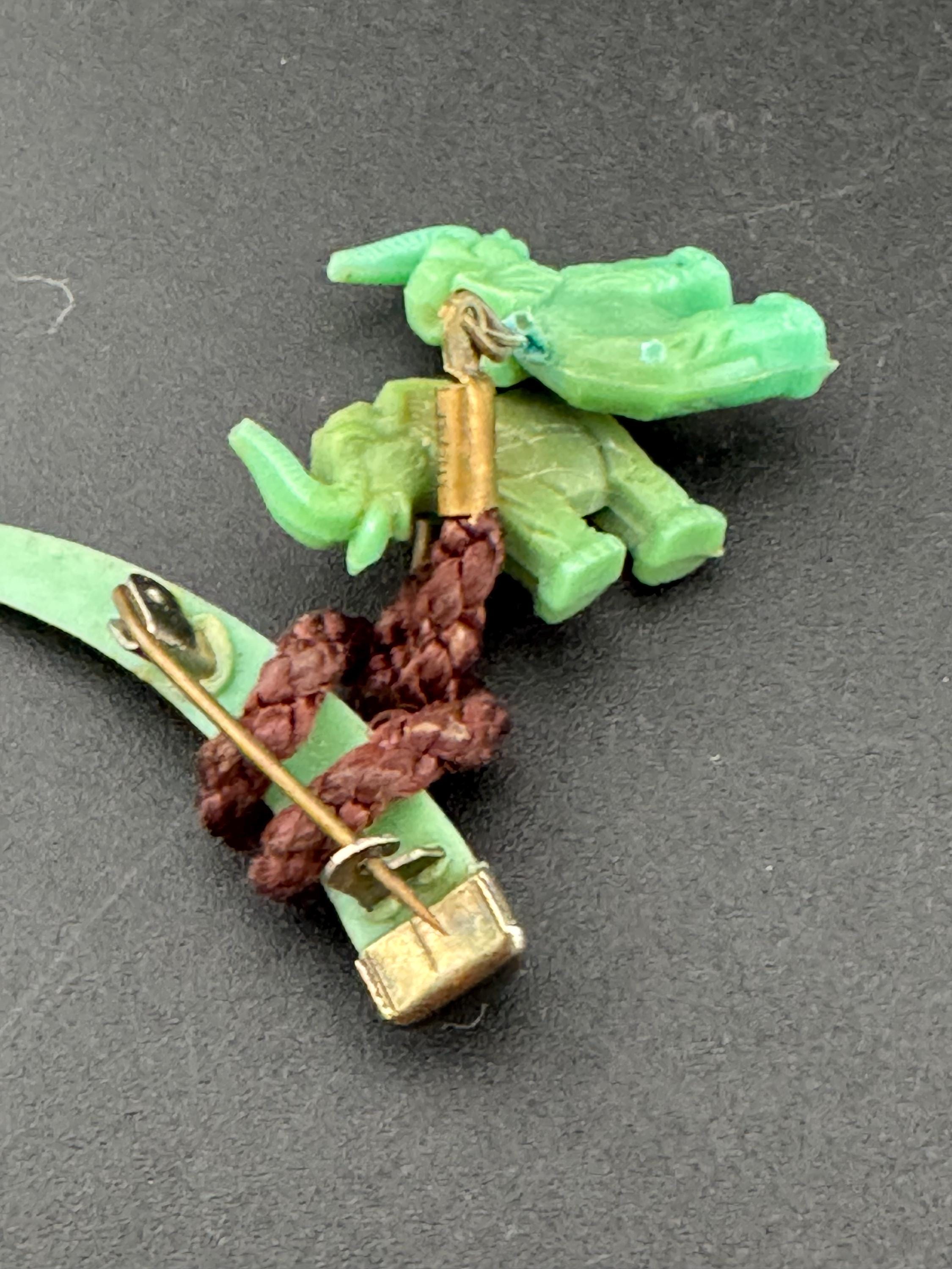 Vintage Celluloid Early Plastic Green dangly Elephant brooch 1920s
