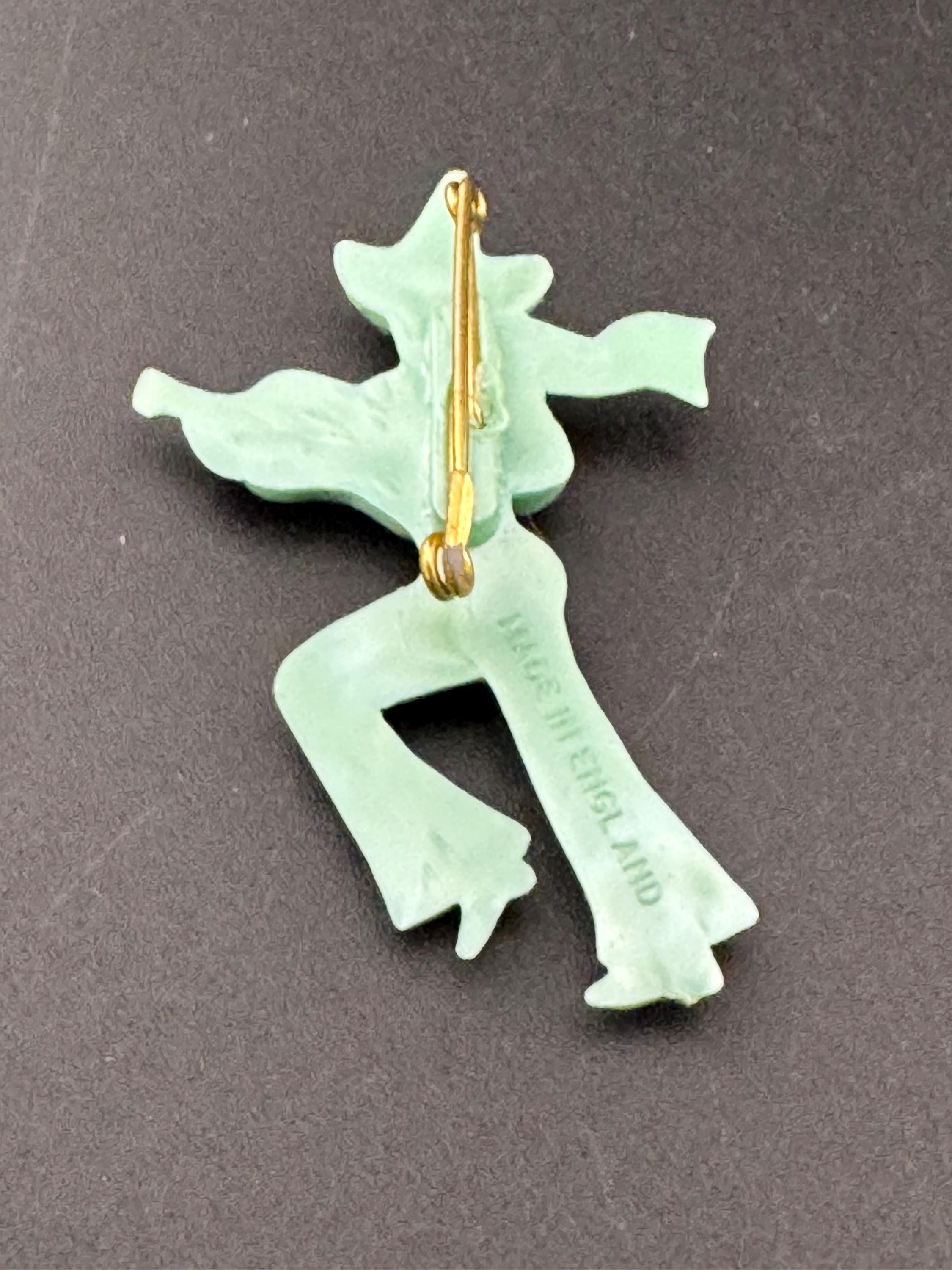 Vintage early Plastic Celluloid Spanish man playing the guitar brooch super kitsch