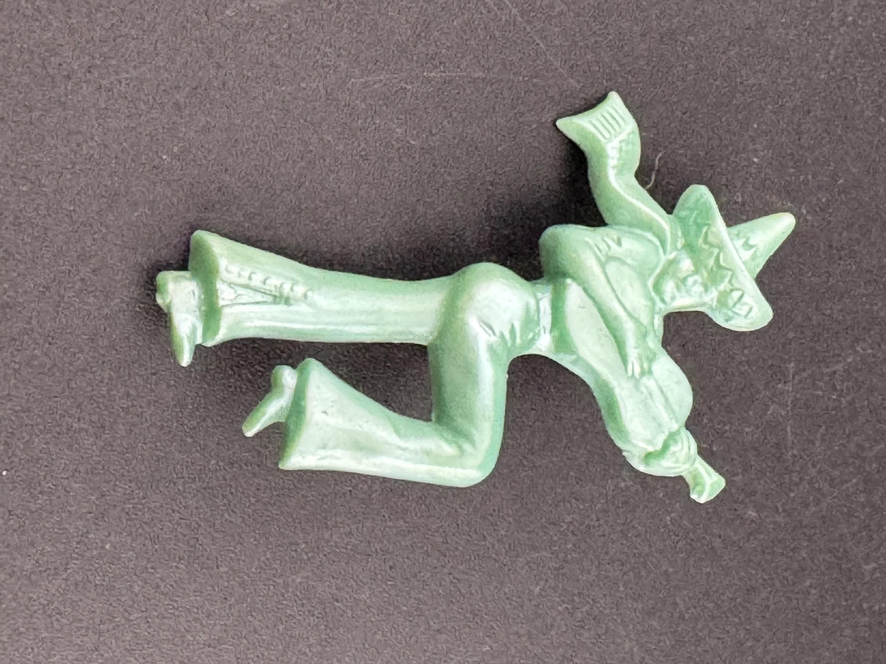 Vintage early Plastic Celluloid Spanish man playing the guitar brooch super kitsch