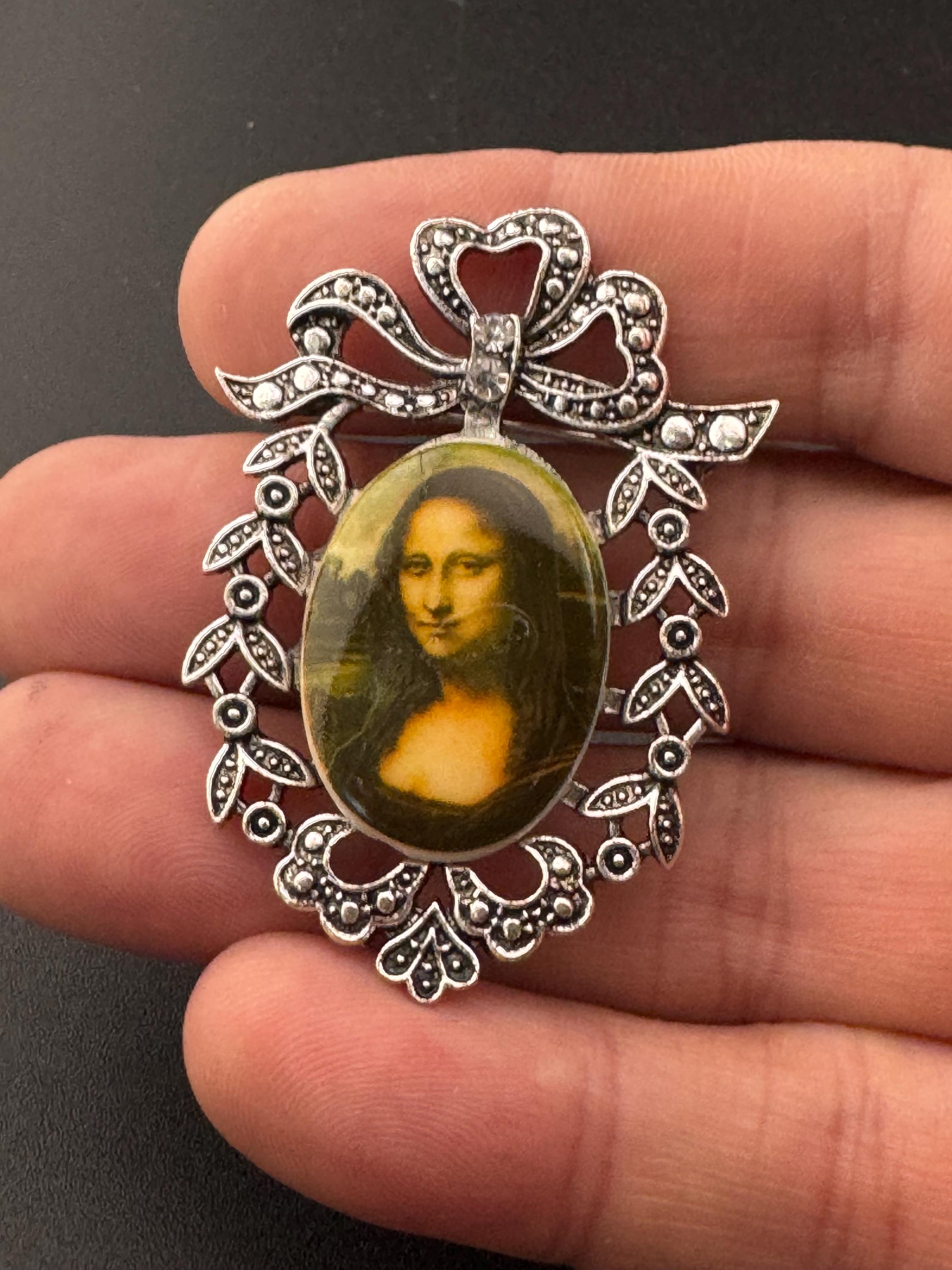 Vintage style handmade MONA LISA brooch with antique silver tone ornate frame using vintage ceramic German cabochons