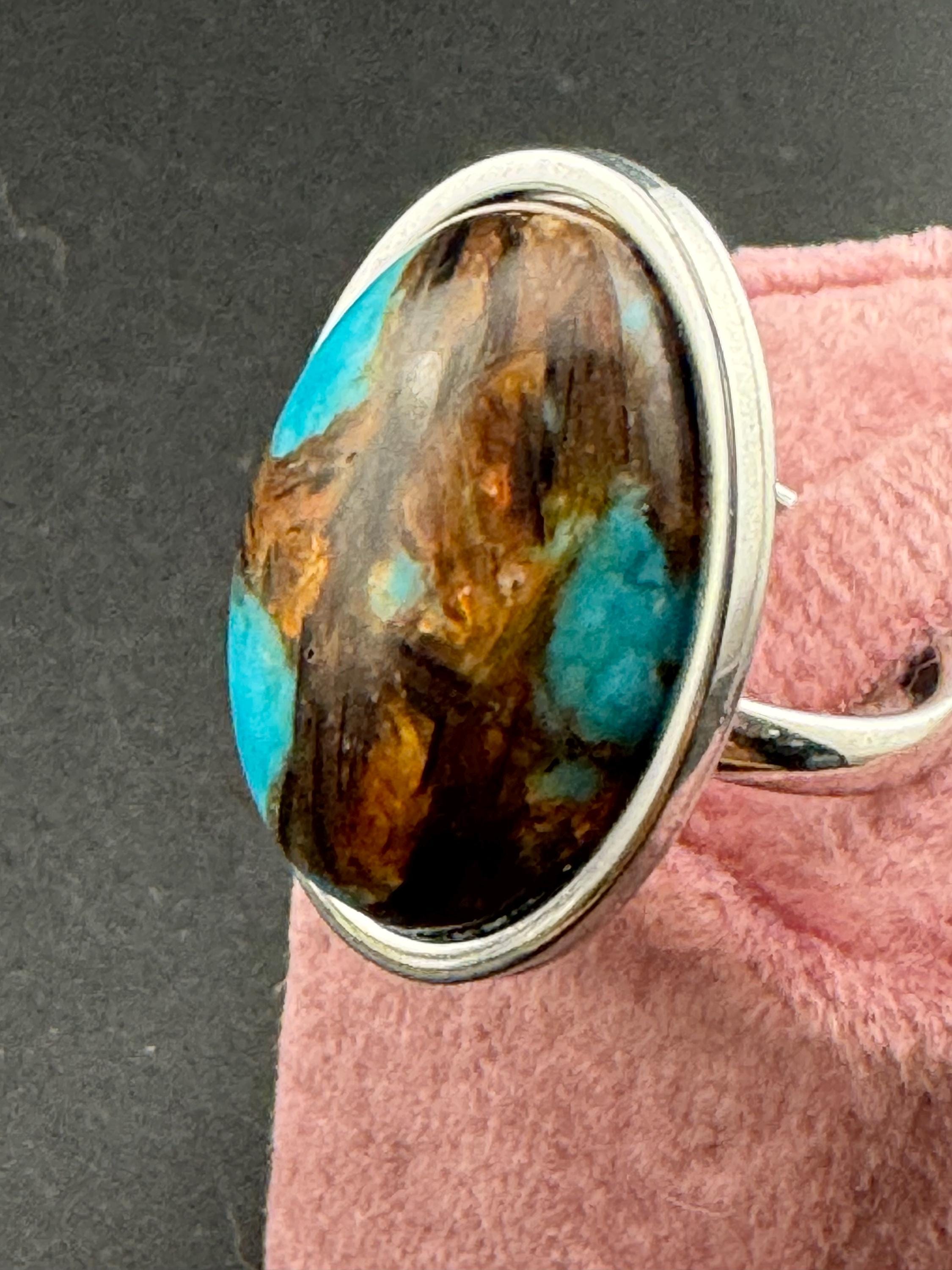 Oversized oval turquoise blue gemstone dress ring in non tarnish stainless steel, adjustable fit