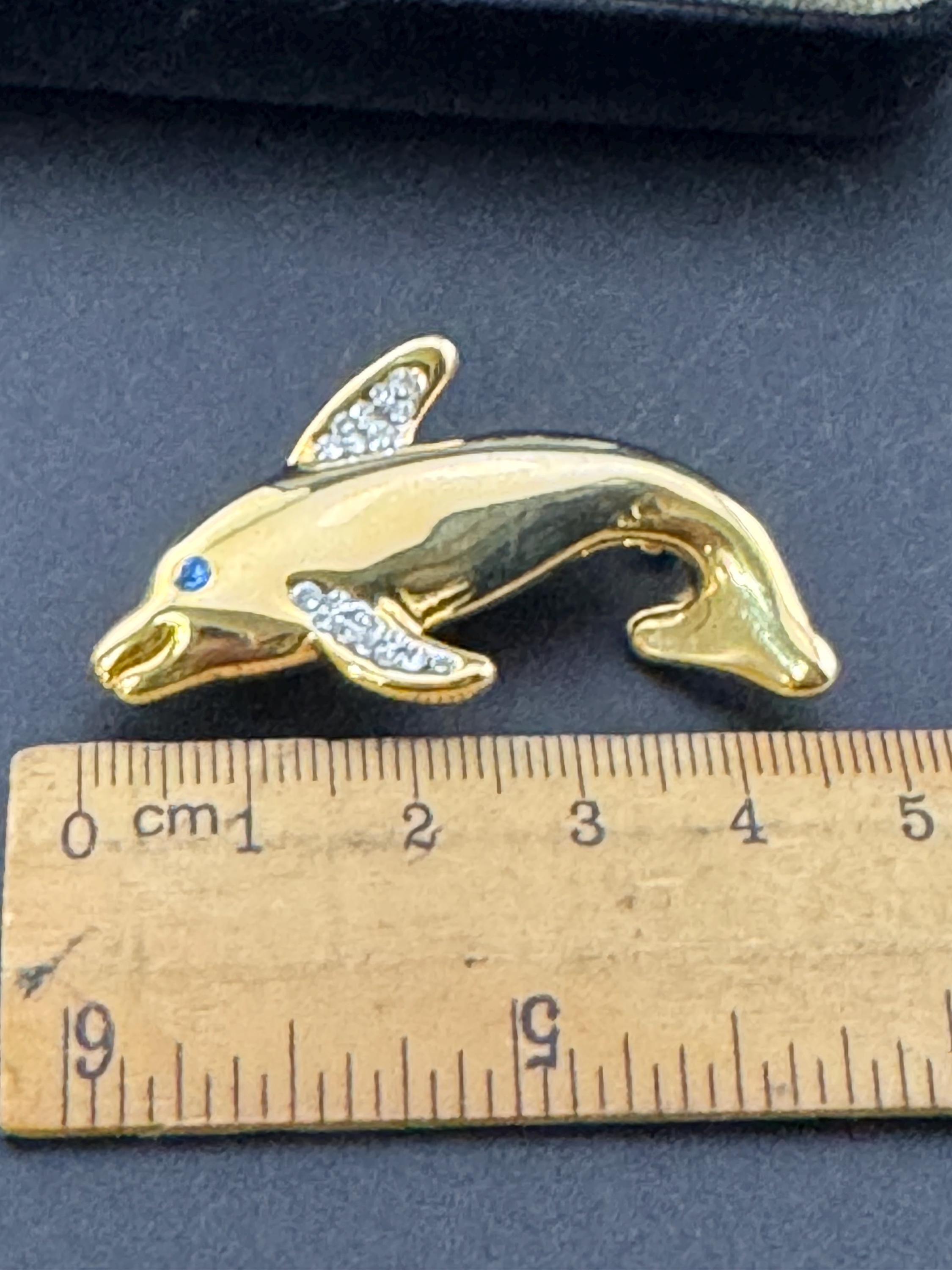 Boxed signed Pierre Cardin gold plated crystal diamanté dolphin brooch
