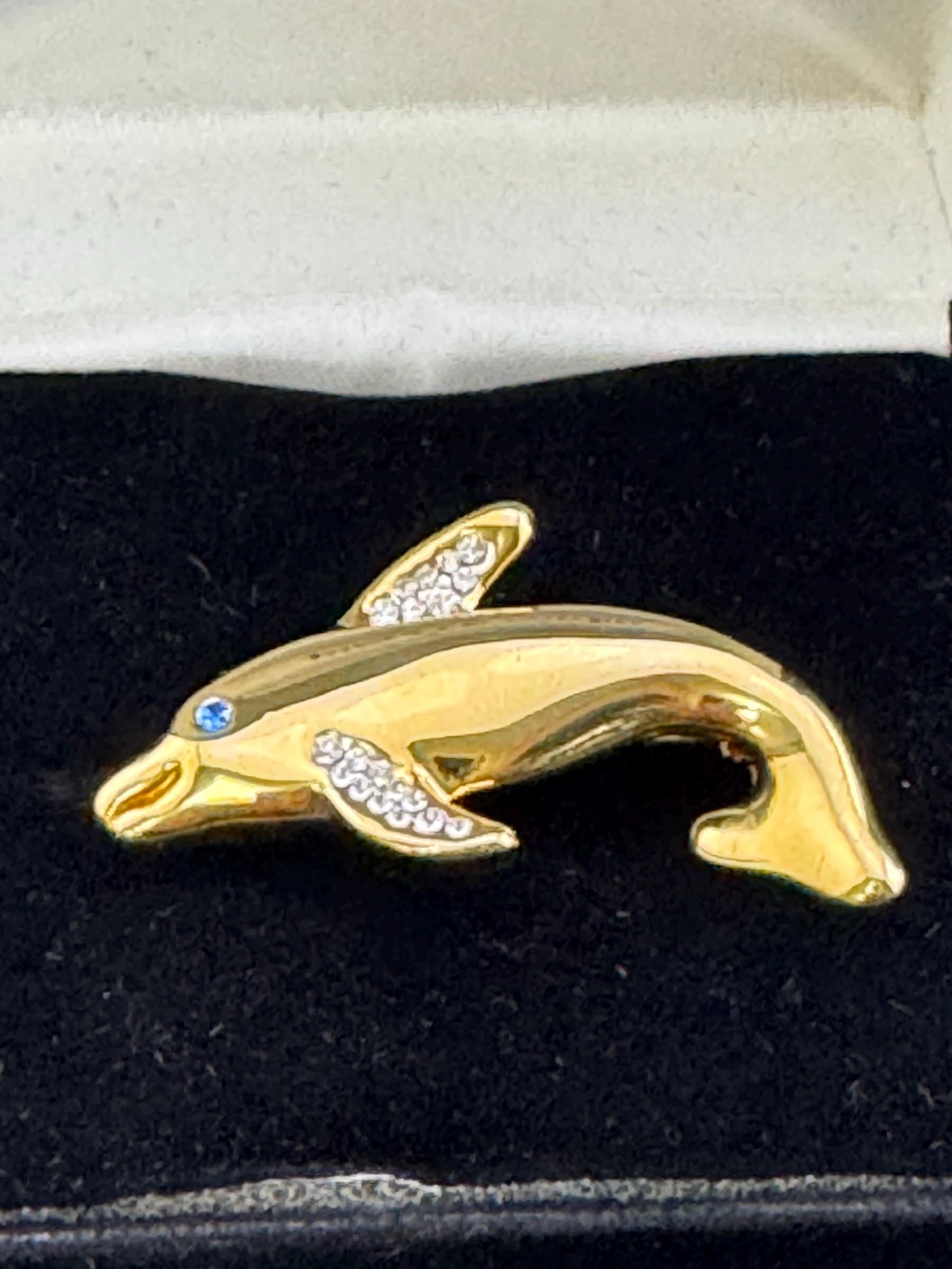 Boxed signed Pierre Cardin gold plated crystal diamanté dolphin brooch
