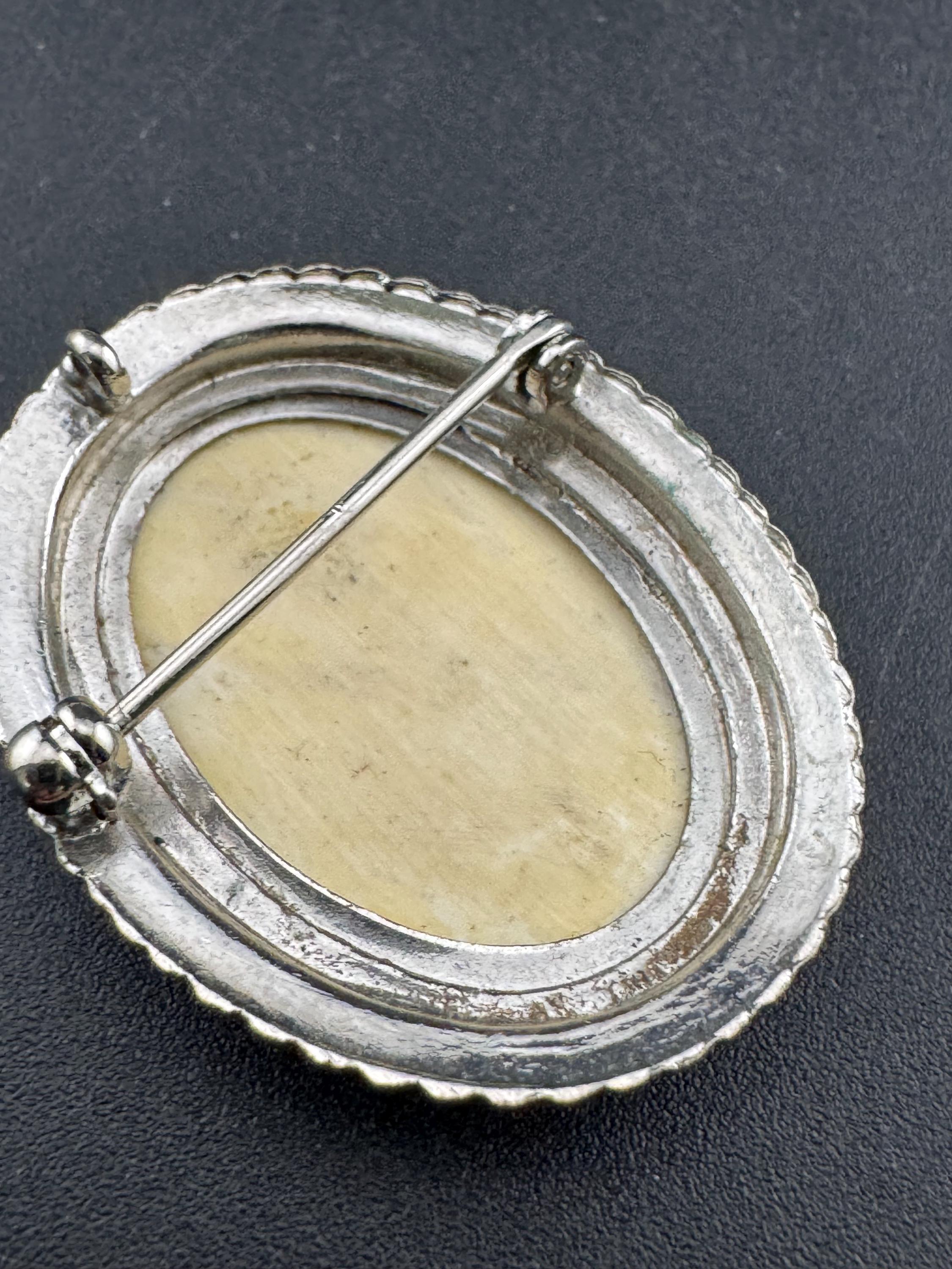 antique style scrimshaw faux bone  silver tone oval brooch, reproduction