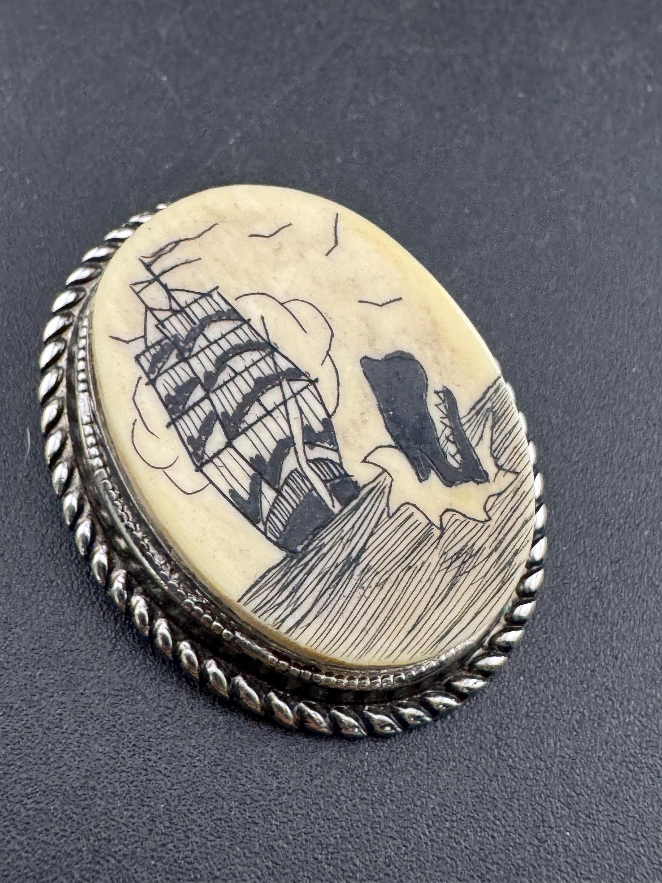 antique style scrimshaw faux bone  silver tone oval brooch, reproduction