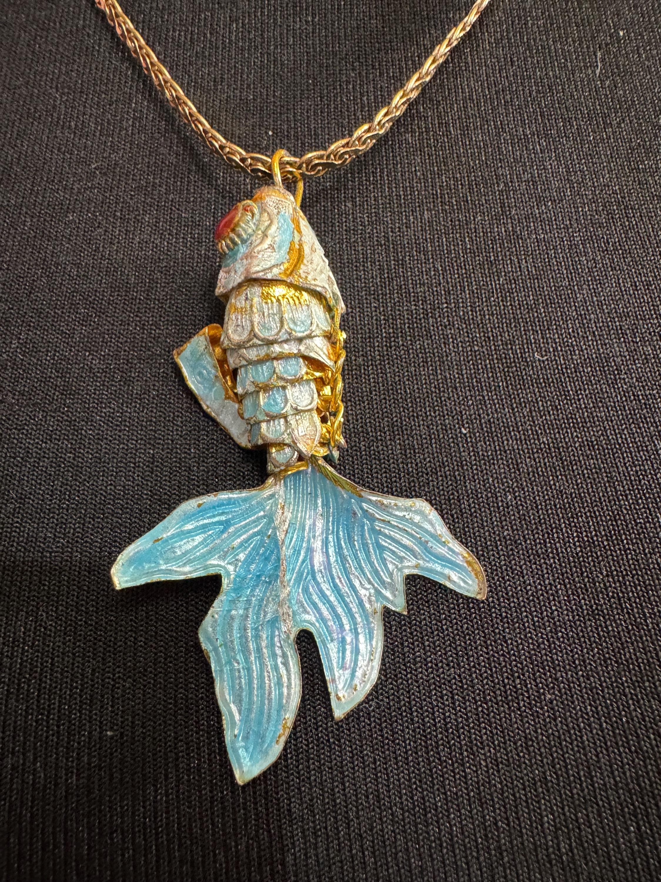 Vintage blue enamel articulated gold fish pendant on a 75 gold plated serpentine chain