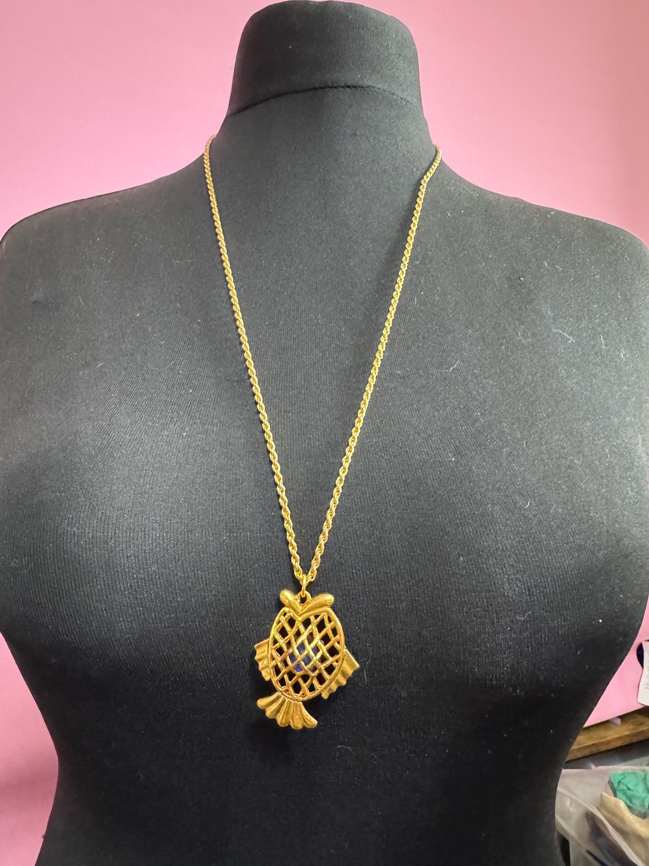 Vintage blue beaded woven caged gold fish pendant on a 75 gold plated rope chain
