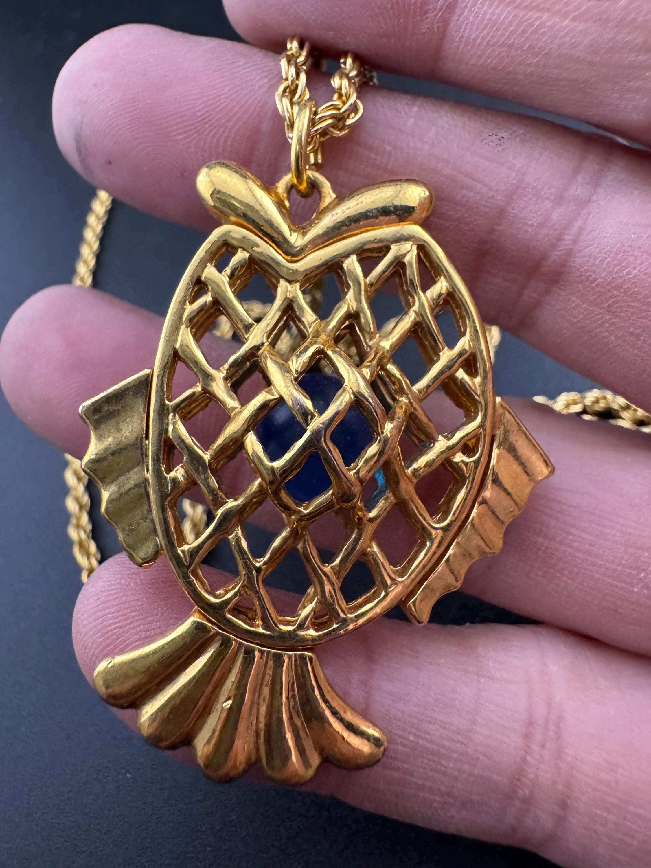 Vintage blue beaded woven caged gold fish pendant on a 75 gold plated rope chain