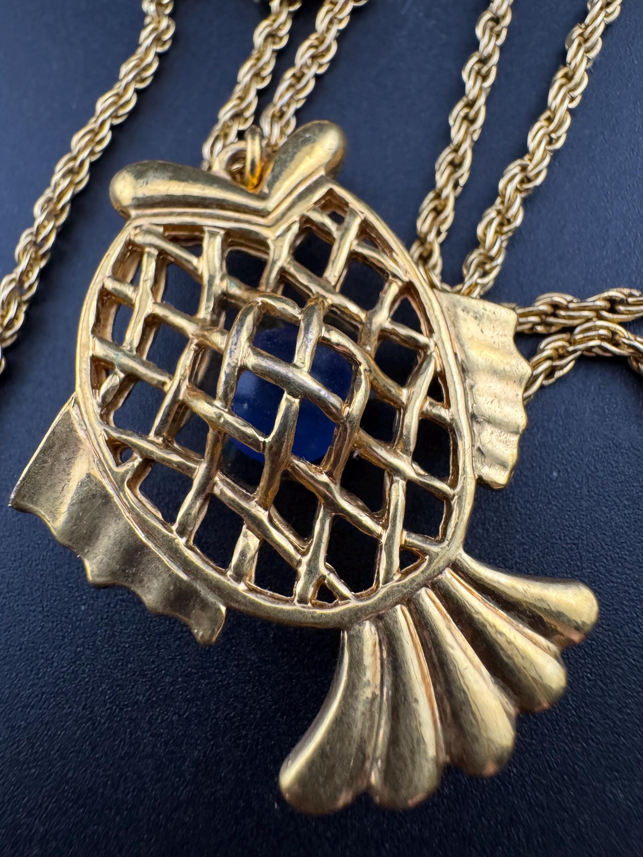 Vintage blue beaded woven caged gold fish pendant on a 75 gold plated rope chain