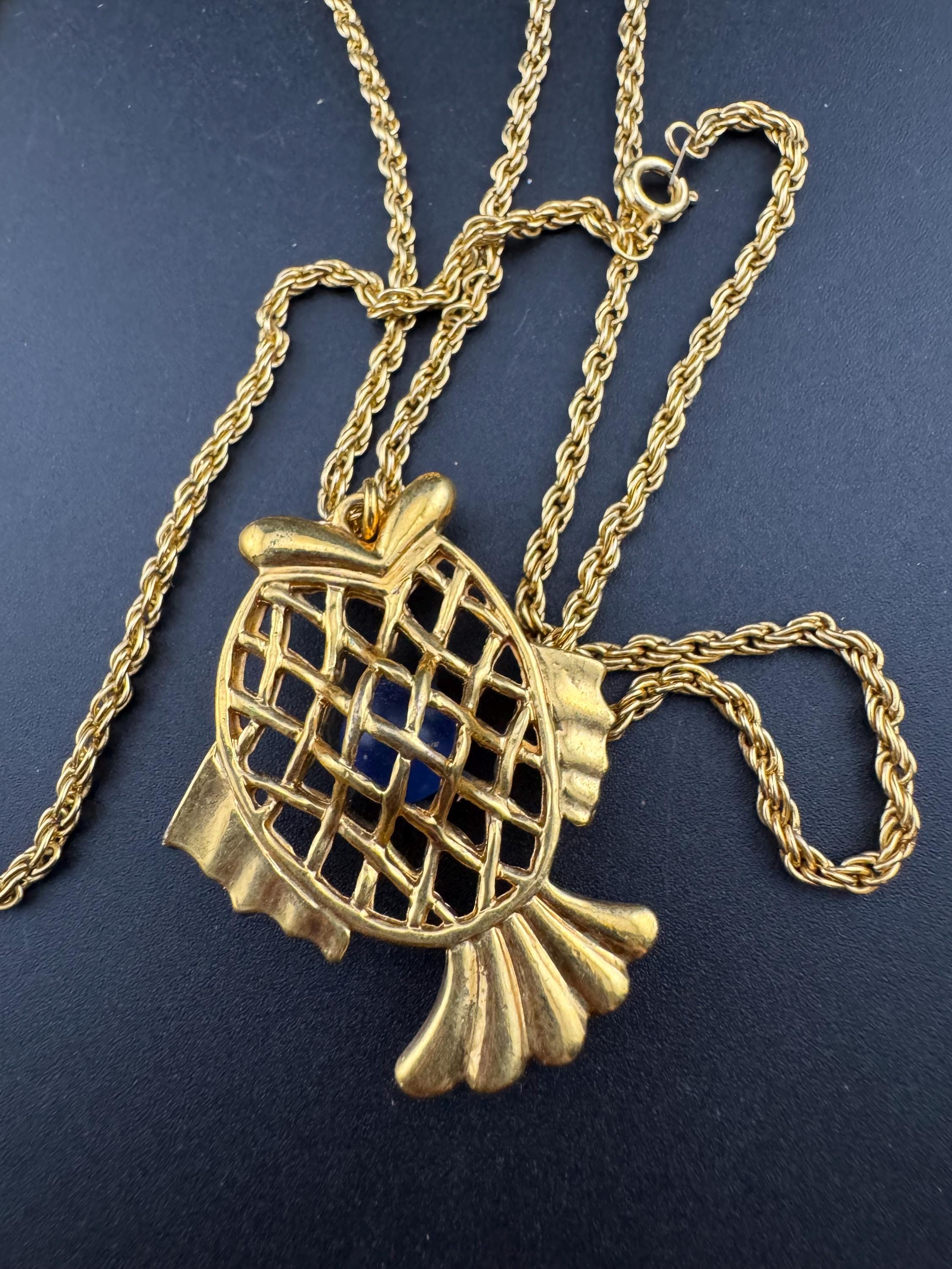 Vintage blue beaded woven caged gold fish pendant on a 75 gold plated rope chain