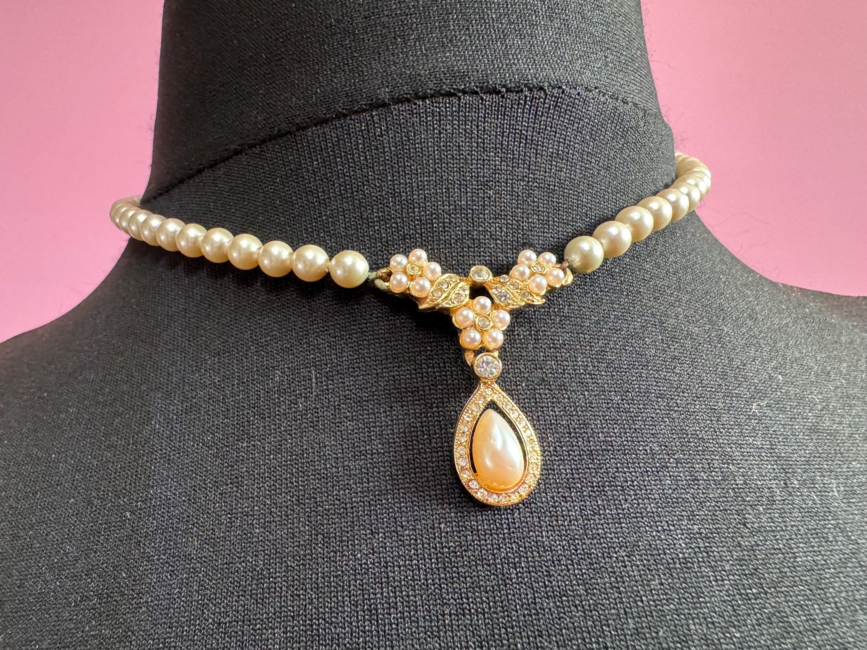 Signed Rosita cream glass pearl necklace with teardrop pendant, single strand row of pearls gold tone