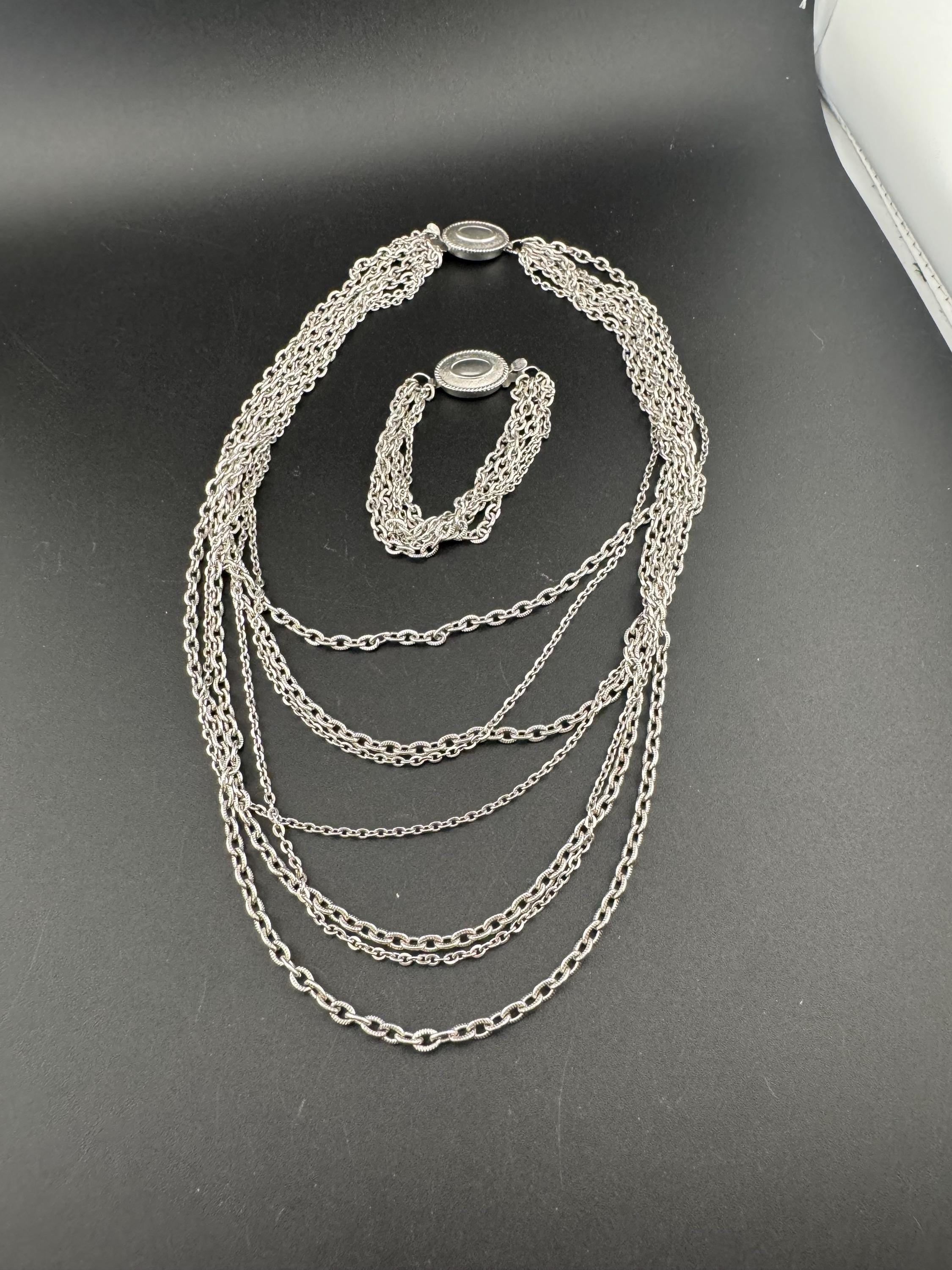 Signed Avon Vintage silver tone multi strand necklace and matching bracelet jewellery set