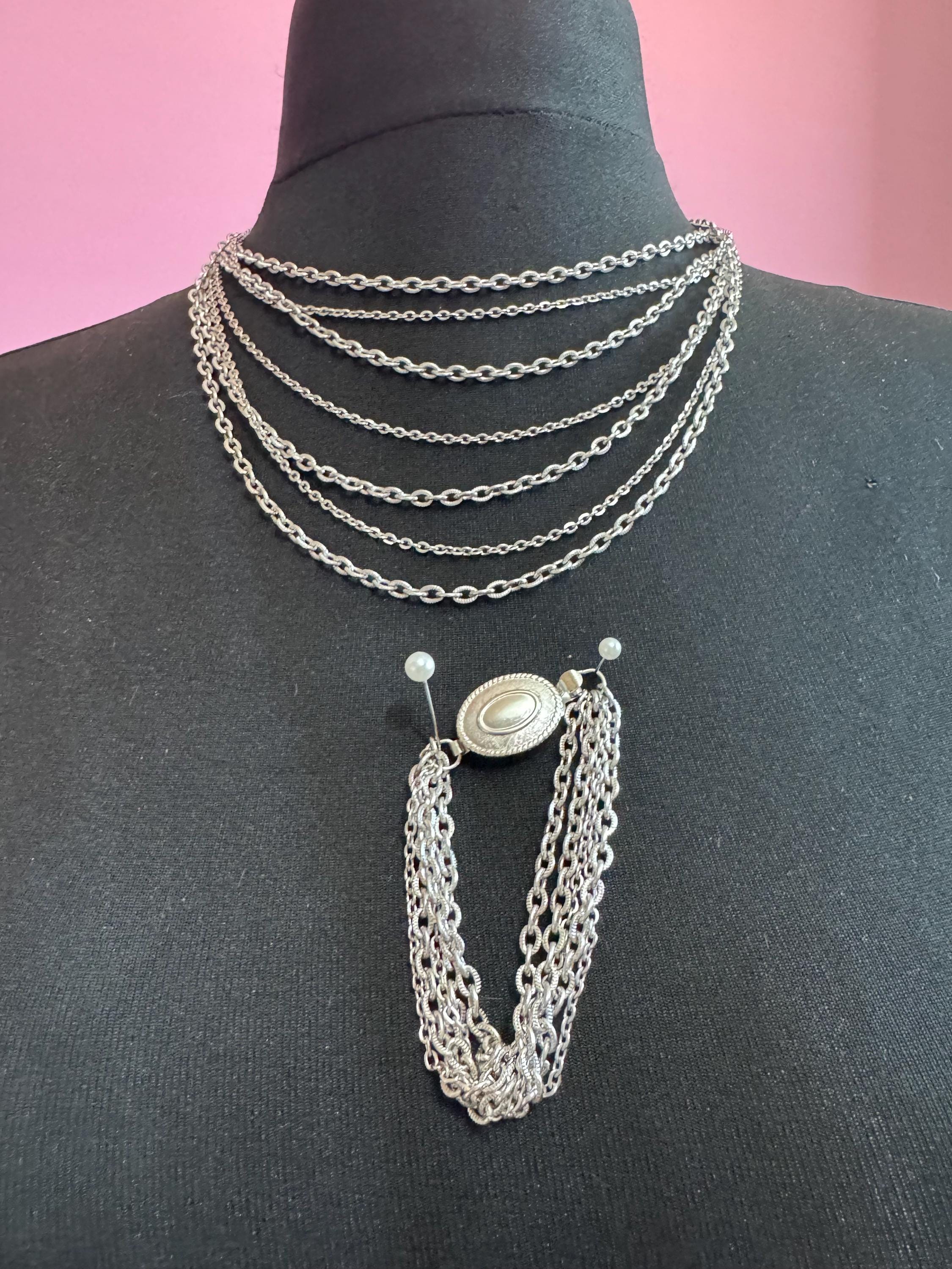 Signed Avon Vintage silver tone multi strand necklace and matching bracelet jewellery set