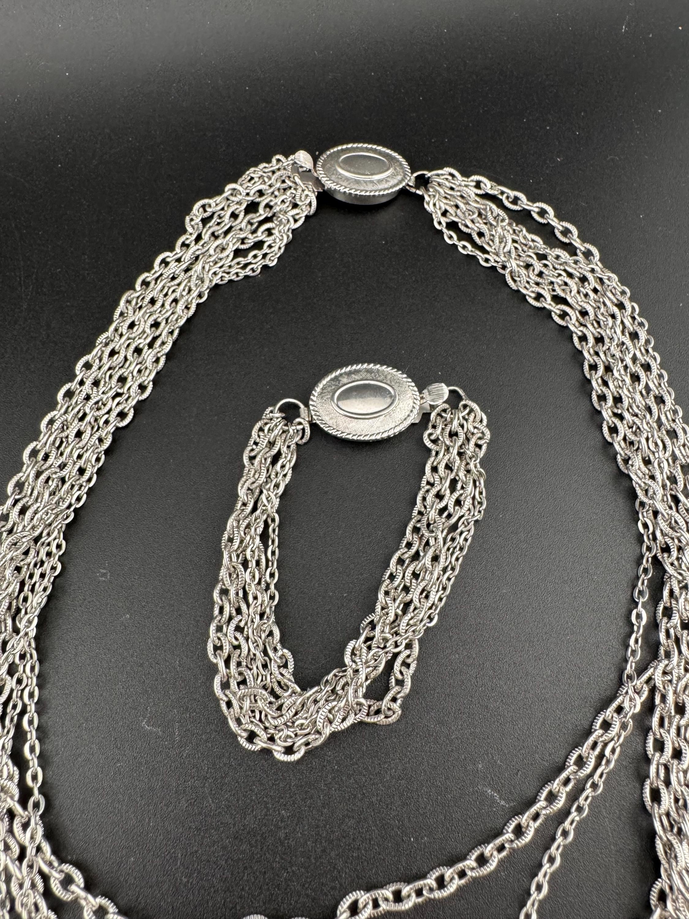 Signed Avon Vintage silver tone multi strand necklace and matching bracelet jewellery set