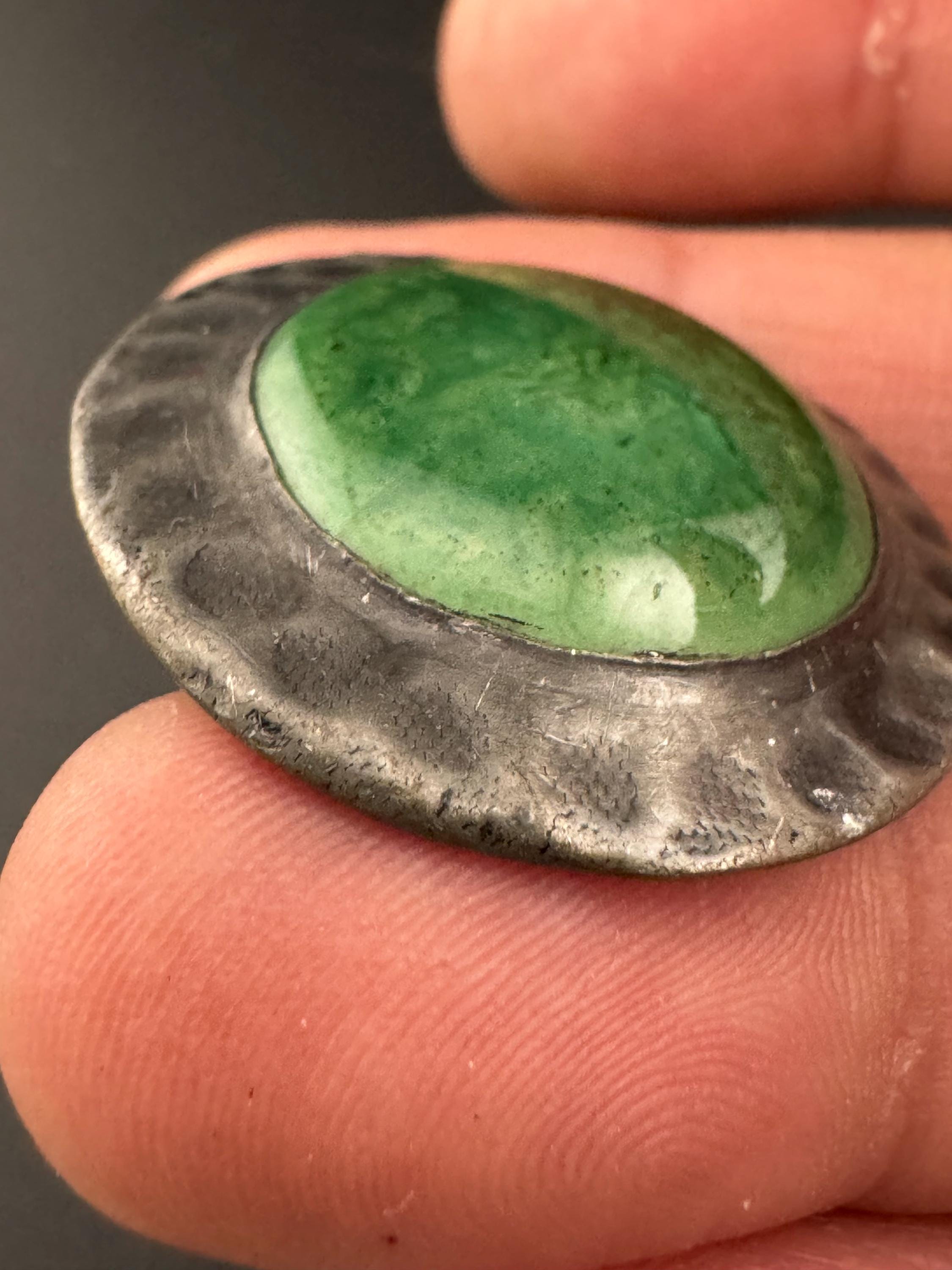 Antique arts and crafts period beaten metal brooch green cabochon in art nouveau