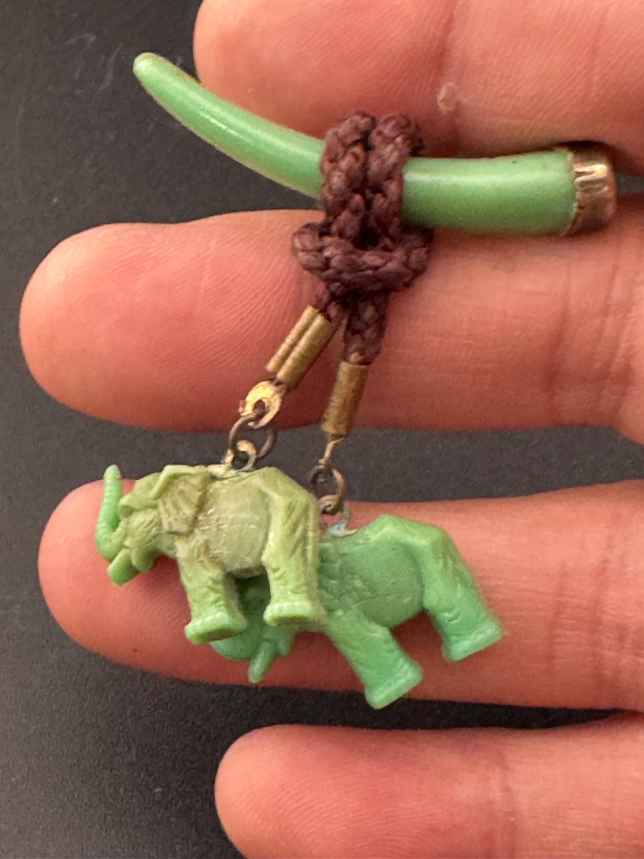 Vintage Celluloid Early Plastic Green dangly Elephant brooch 1920s