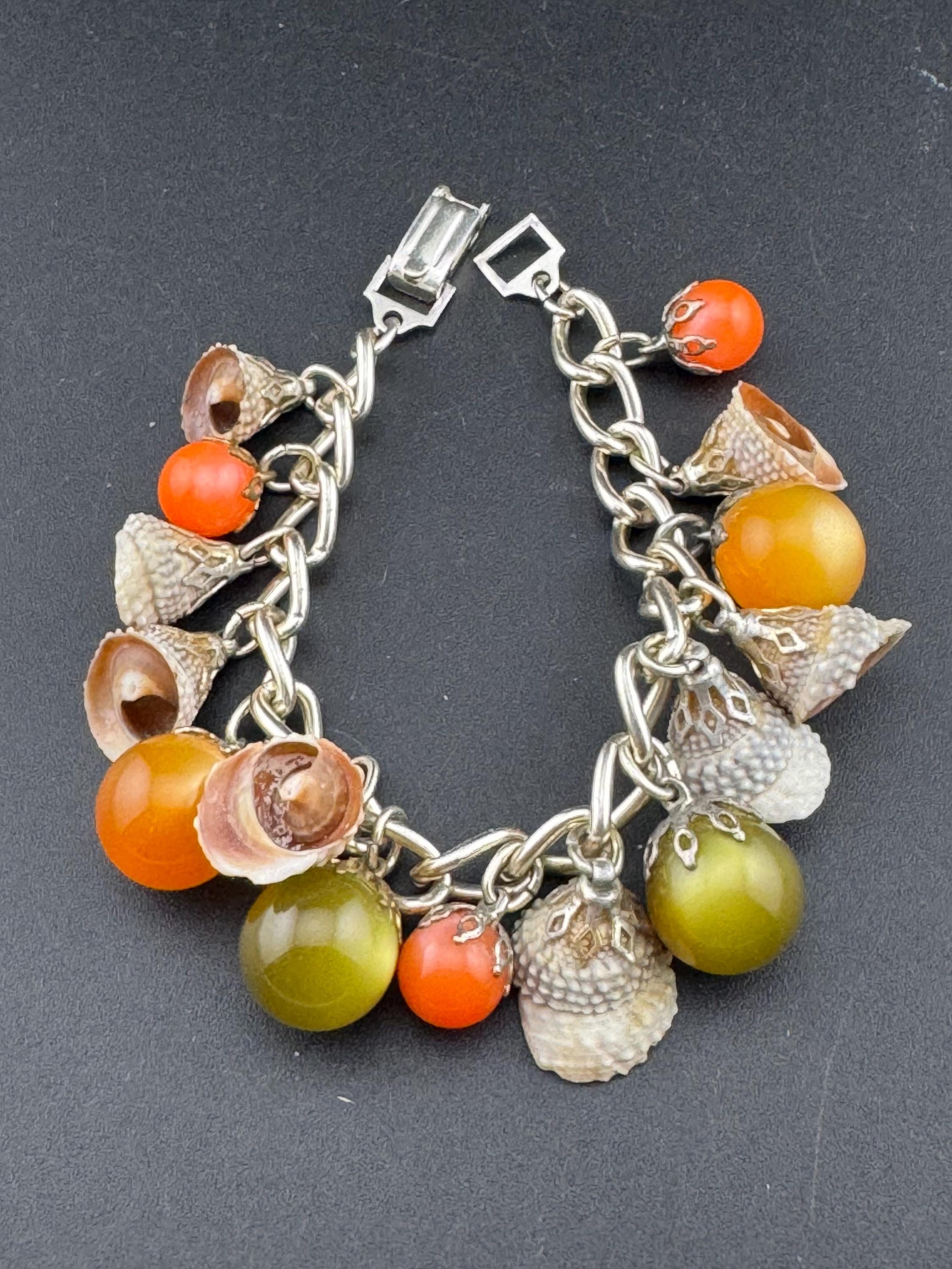 Vintage chunky 1970s lightweight aluminium silver tone chain link charm bracelet nautical seashells orange green tones