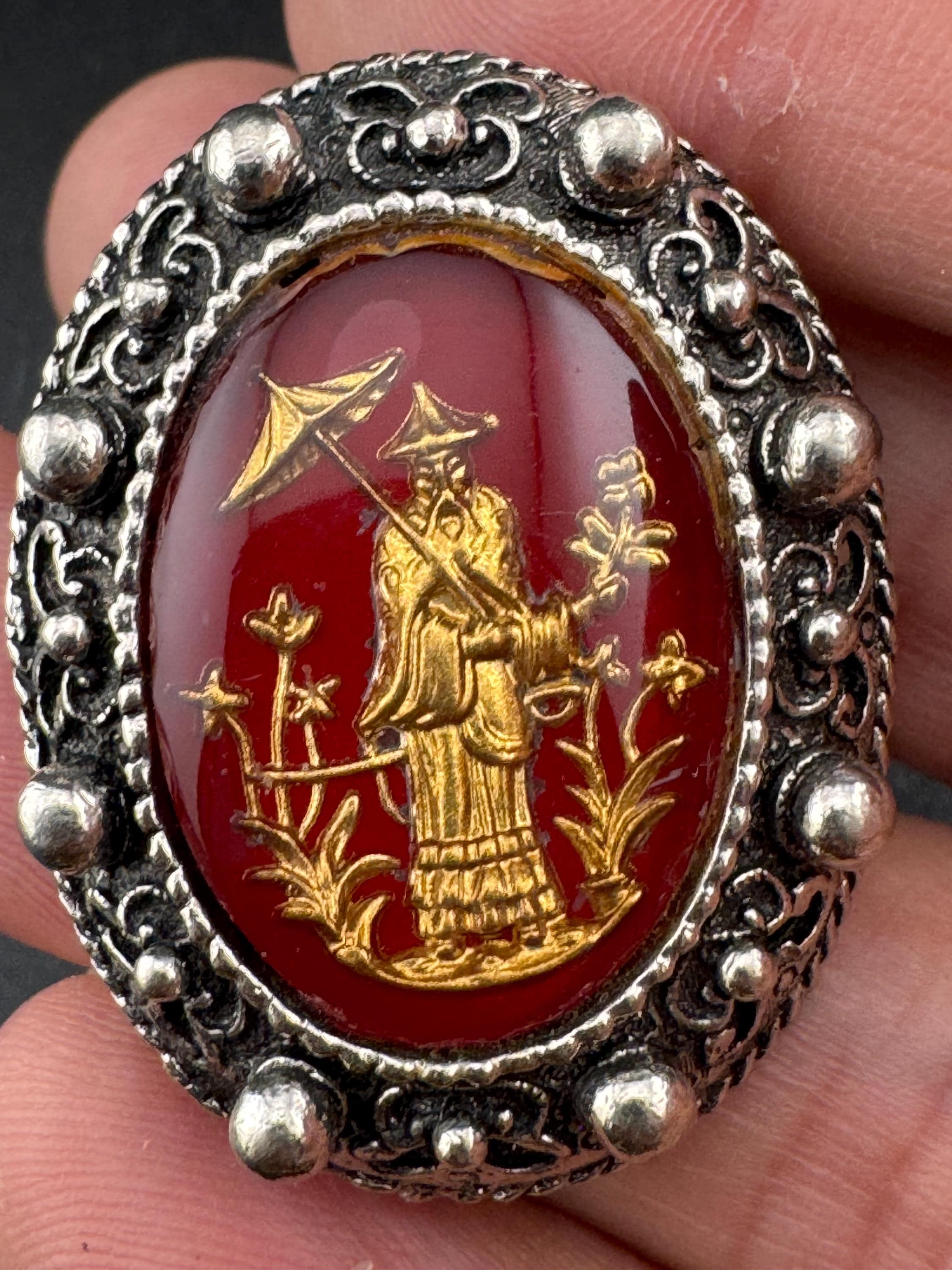 Vintage silver tone metal reverse carved red plastic Chinese scene 1970s scarf clip