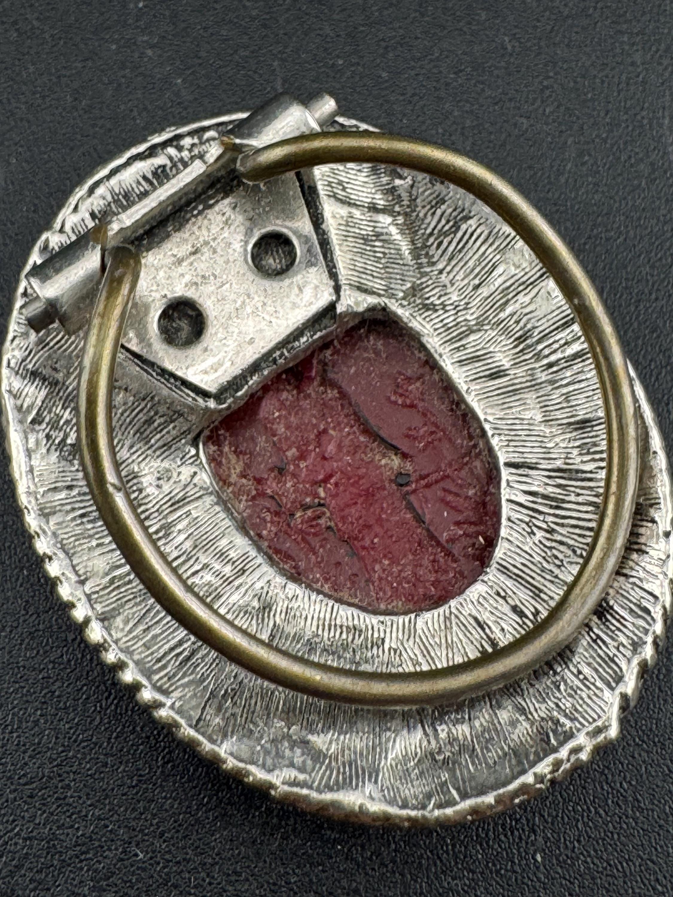 Vintage silver tone metal reverse carved red plastic Chinese scene 1970s scarf clip