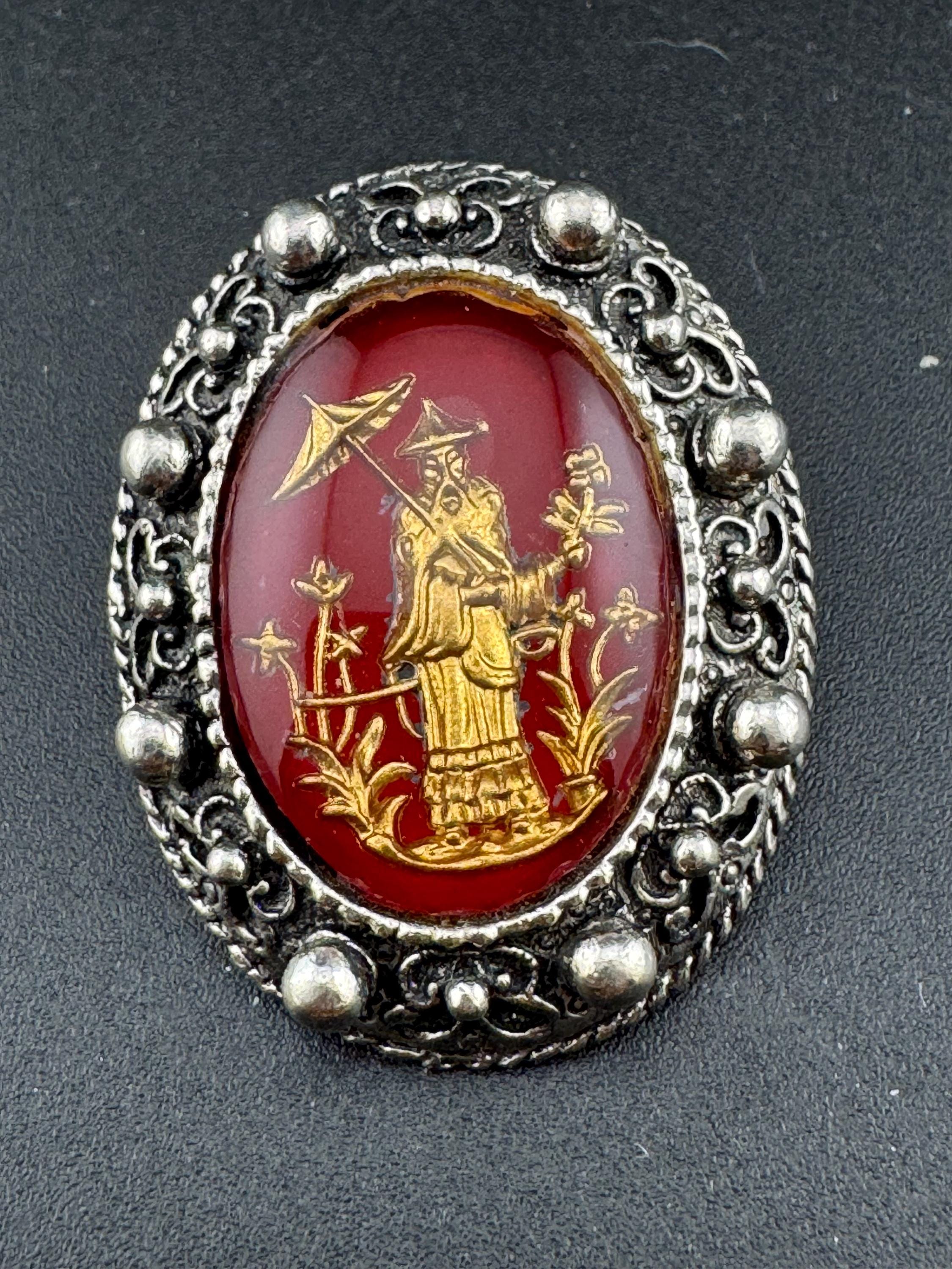 Vintage silver tone metal reverse carved red plastic Chinese scene 1970s scarf clip