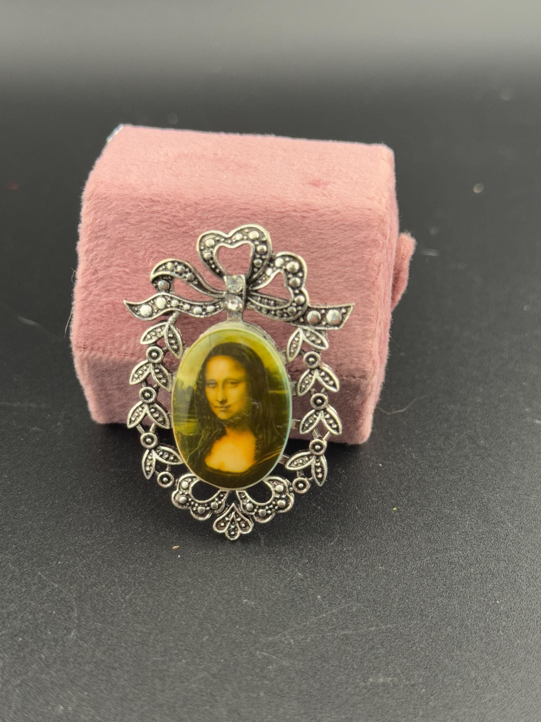 Vintage style handmade MONA LISA brooch with antique silver tone ornate frame using vintage ceramic German cabochons