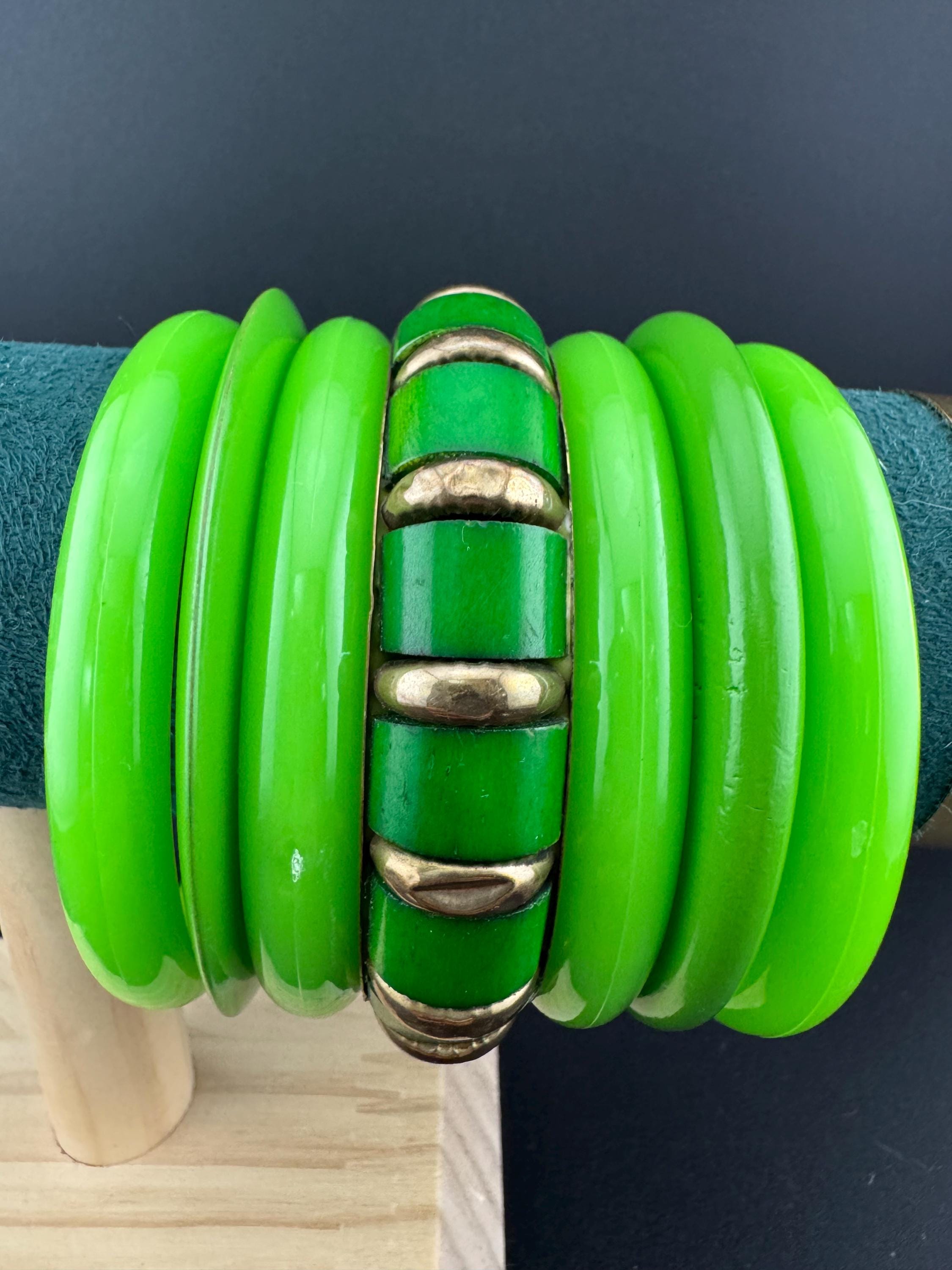 Vintage and retro curated stack of GREEN plastic acrylic bangles, bracelets