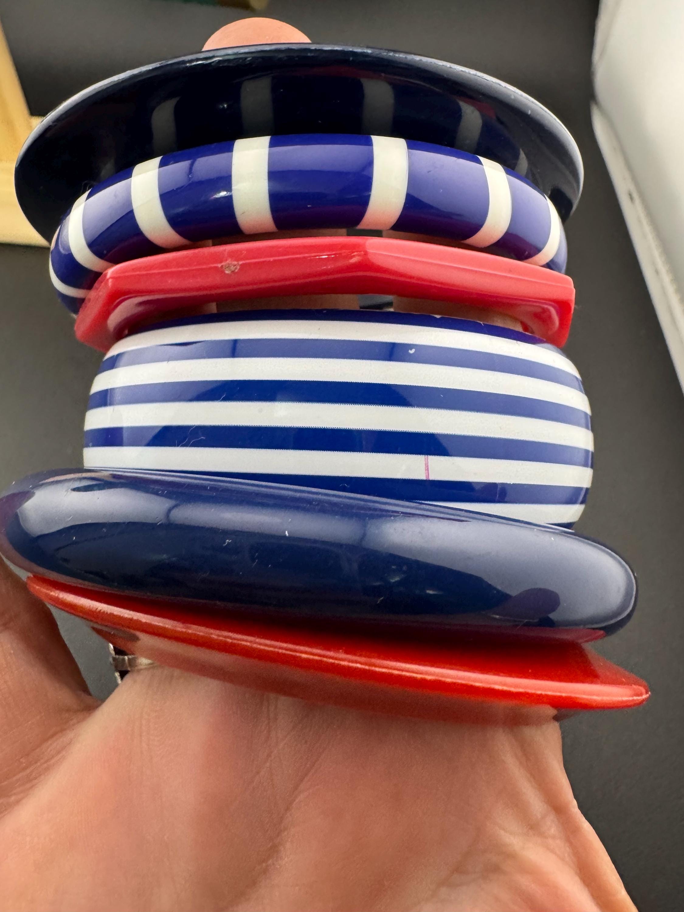 A curated collection of RED WHITE and BLUE stacking bangle bracelets nautical, patriotic, plastic acrylic