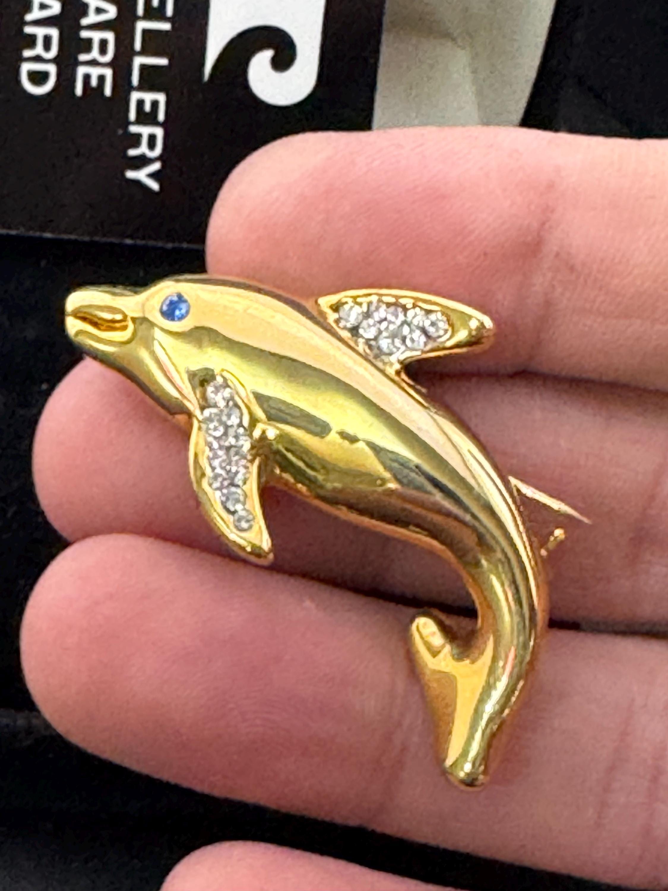 Boxed signed Pierre Cardin gold plated crystal diamanté dolphin brooch