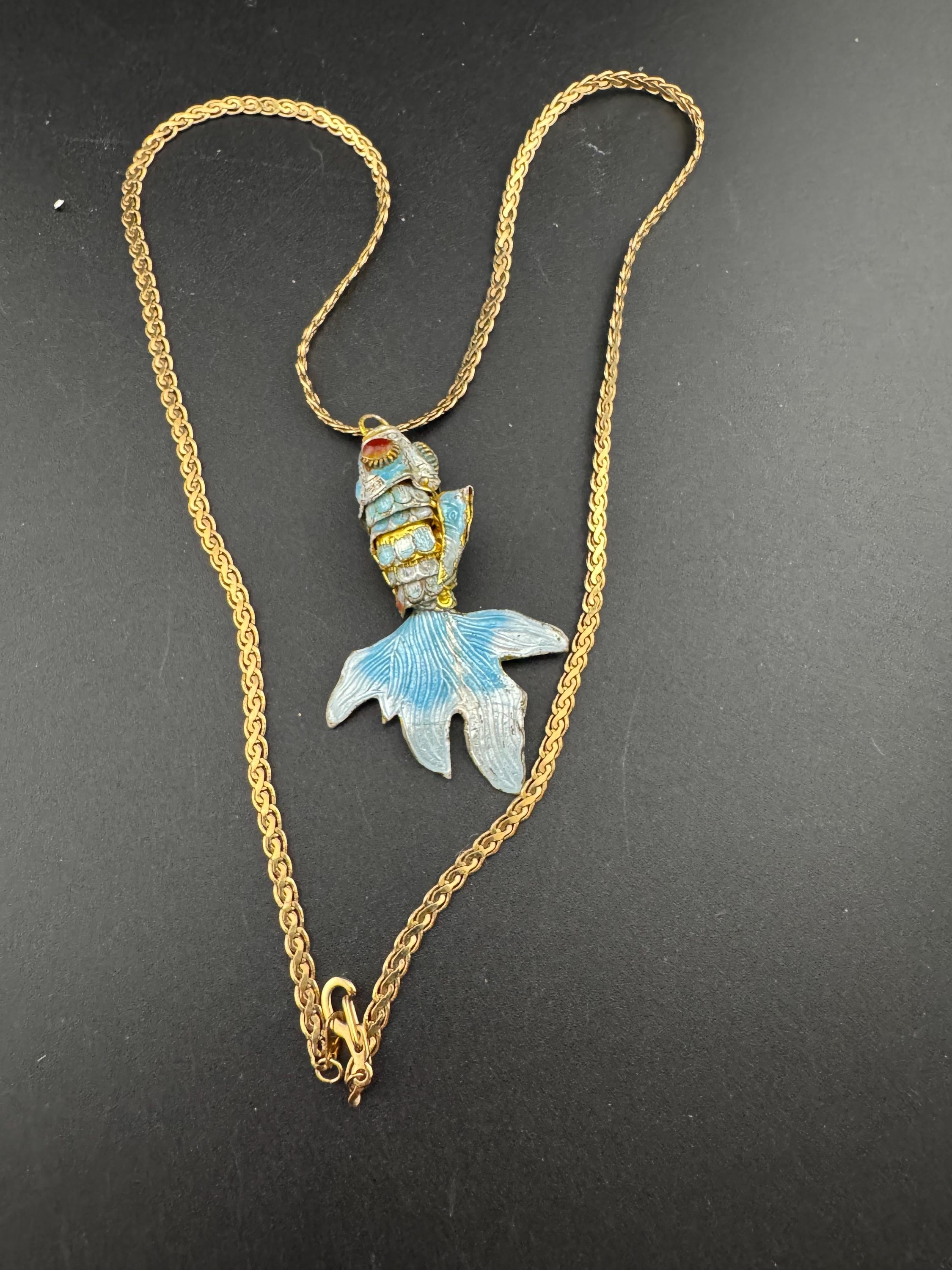 Vintage blue enamel articulated gold fish pendant on a 75 gold plated serpentine chain